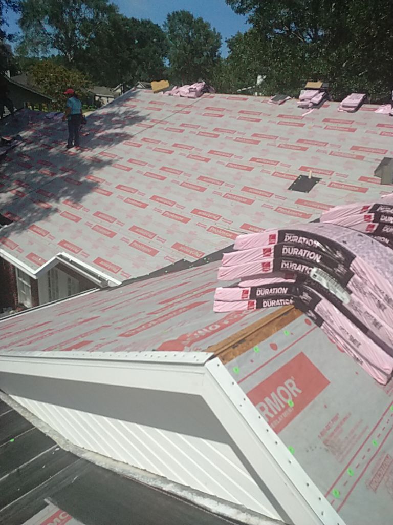 Residential Roofing Installation using Roof Replacement by American Roofing & Construction LLC
