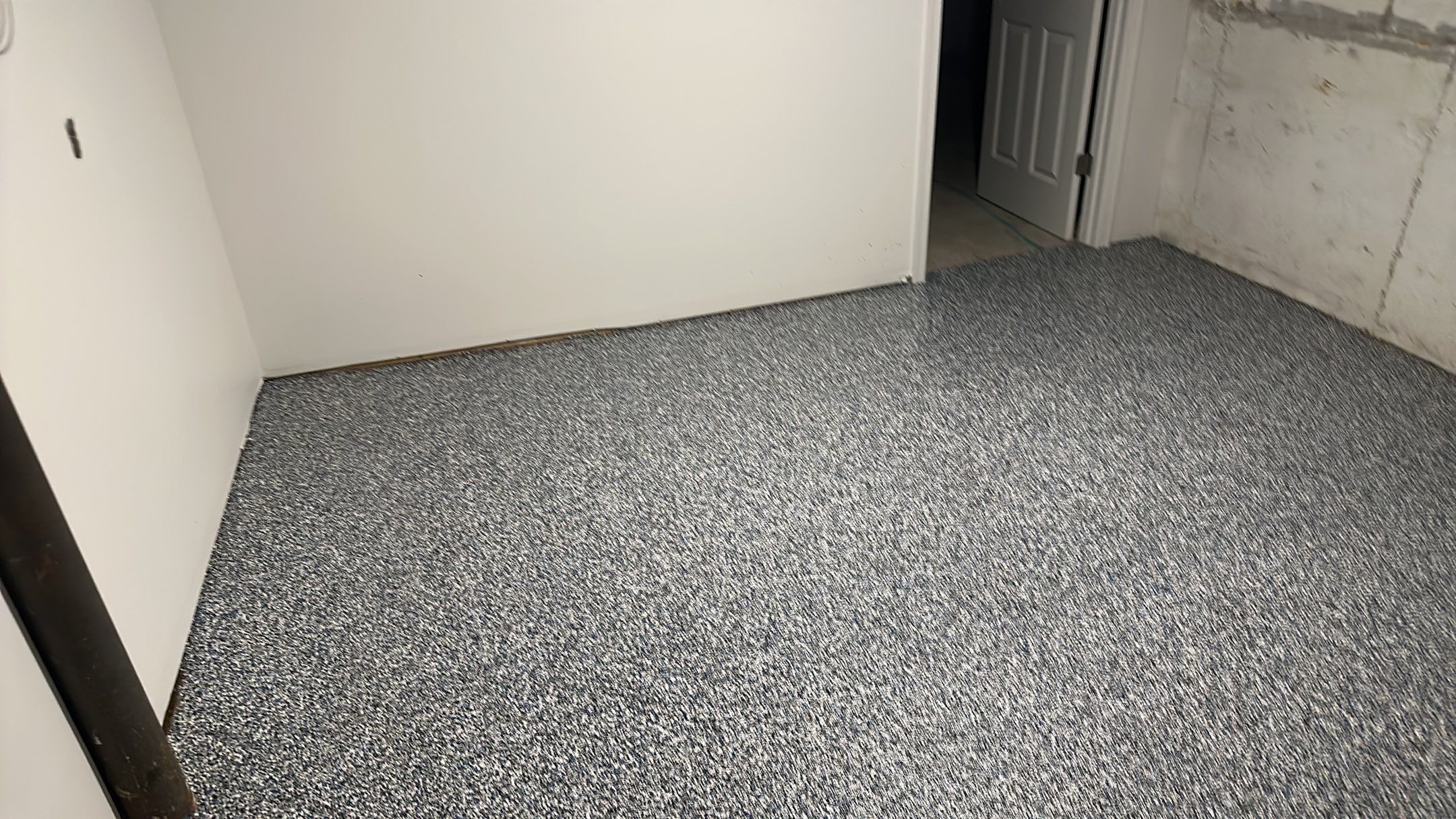 A beautiful Banner Garage Coating in a basement  by Banner Garage