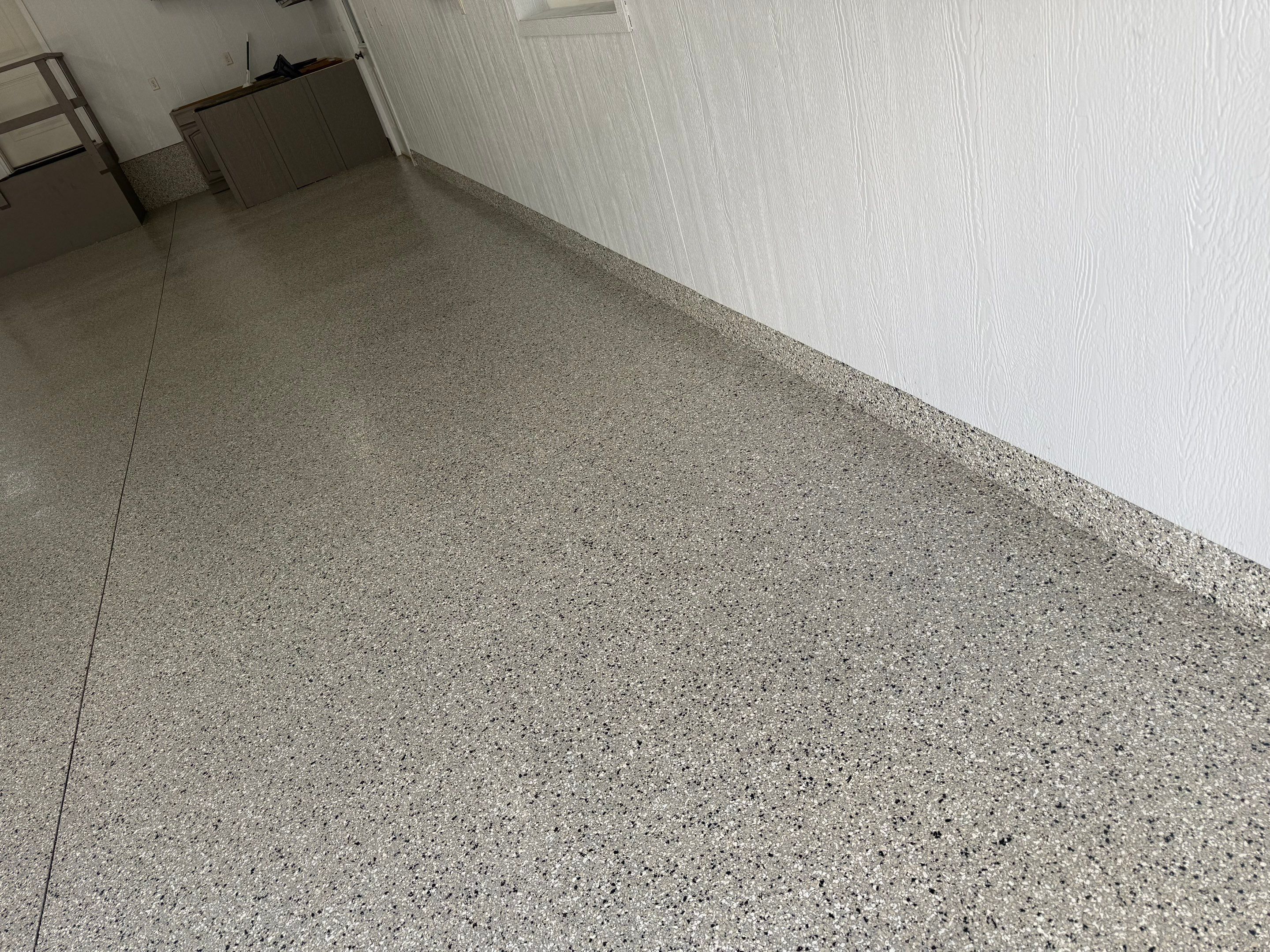 Speckled Epoxy Concrete Coating for Edgerton Garage Floor by Select Painting, Coatings & Garage Cabinets