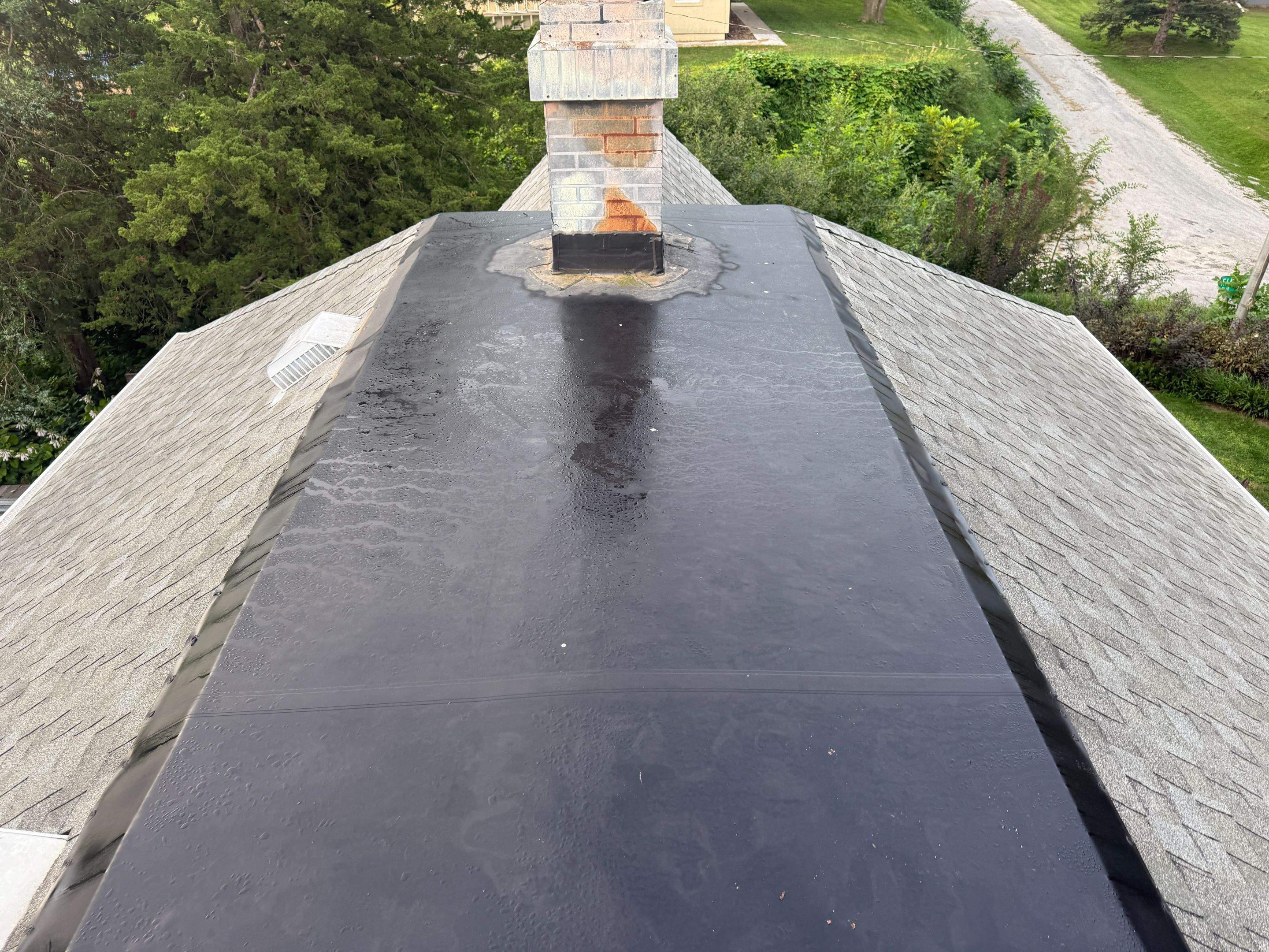 Asphalt Shingle and EPDM Membrane Roof Installation in Mineola by Star Home