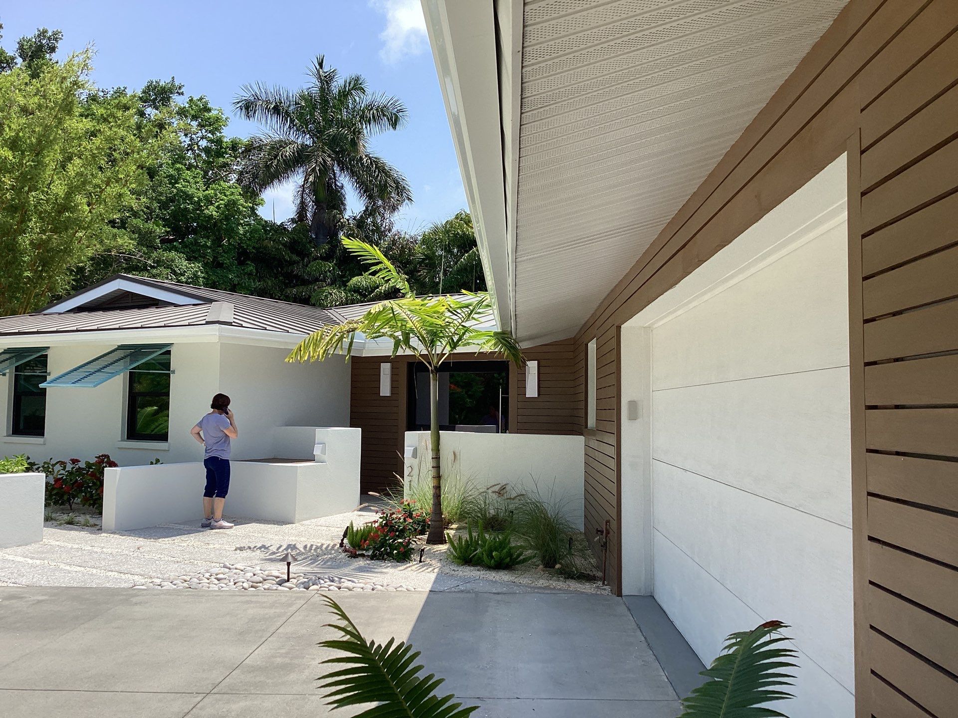 White Seamless Gutters and Downspouts in Sarasota FL by Gutter Professors