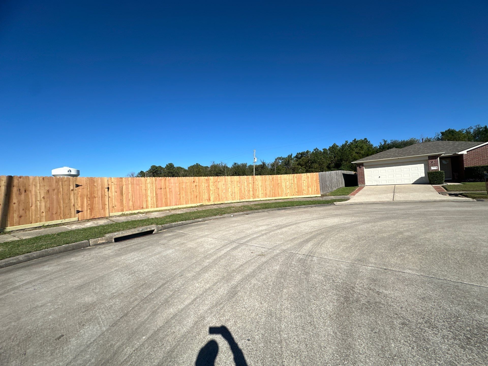 Premium Commercial Fence Installation with Western Red Cedar Pickets, 3 Rails, and Deluxe Wood Gates" by Tim's Fences