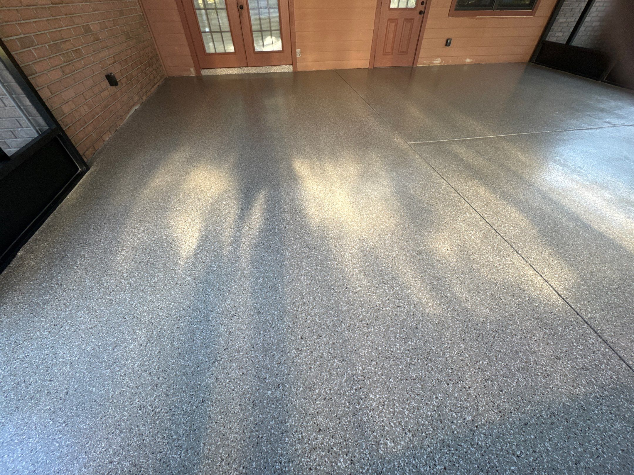 Porch in Lake City, FL in Pebble Beach by Cross Creek Concrete Coatings