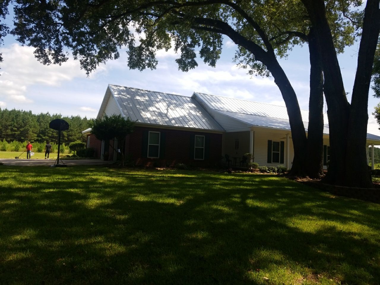Residential Roofing Installation using Metal roofing by American Roofing & Construction LLC
