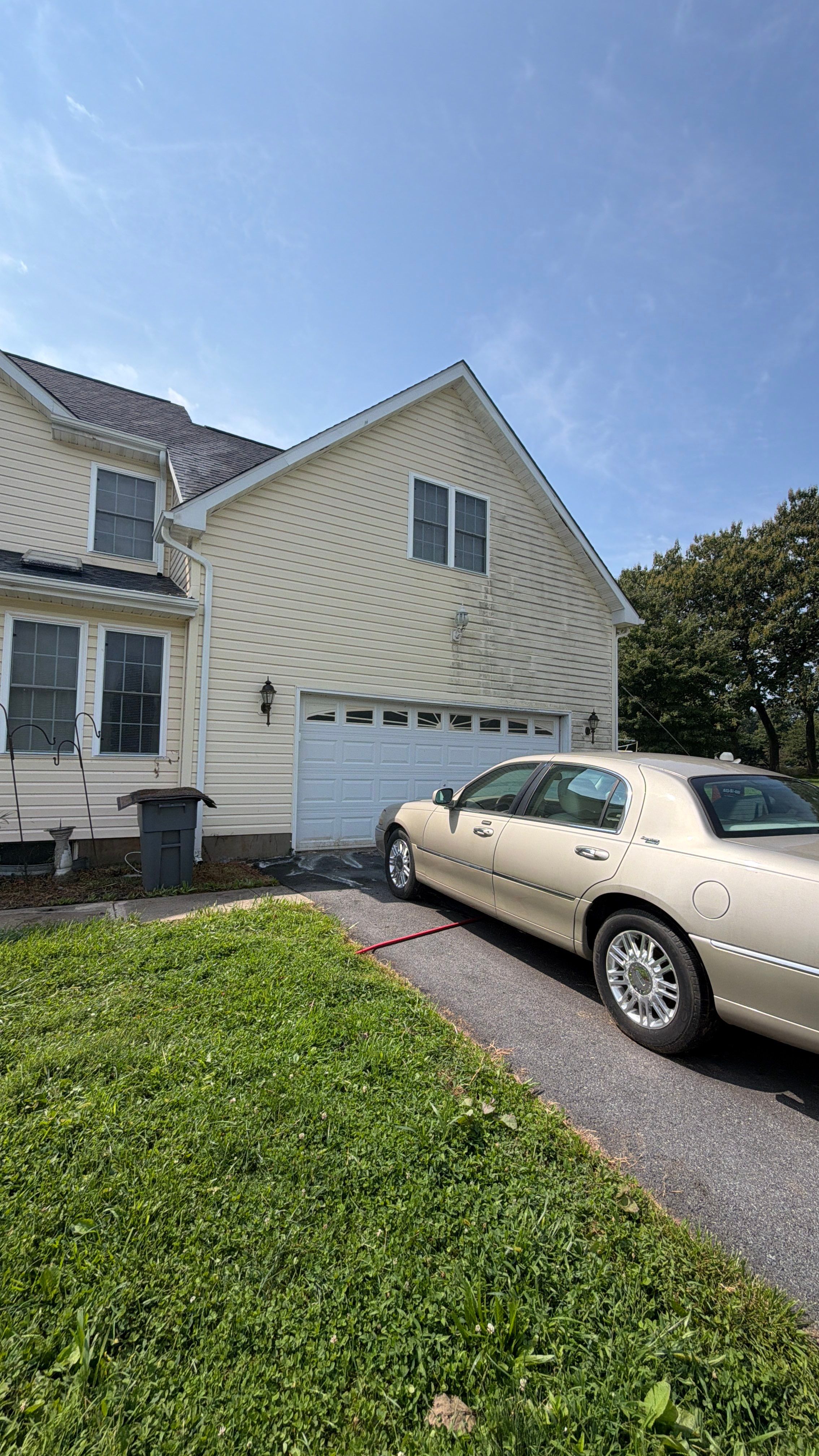 Vinyl Siding House Washing and Wood Deck Restoration in Carroll County by Baltimore Pressure Washers Inc.