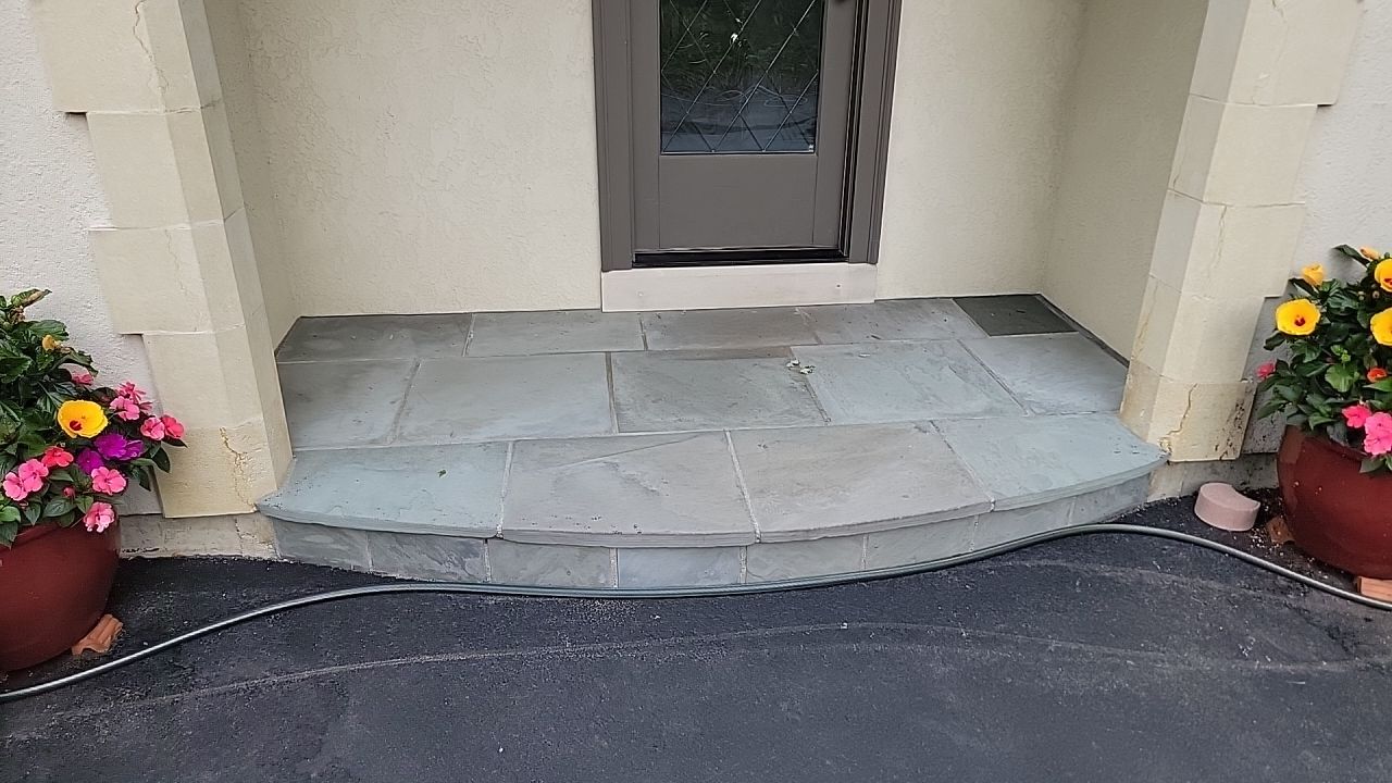 Northbrook, IL stucco home soft wash and stone cleaning by Northern Power Washing LLC.