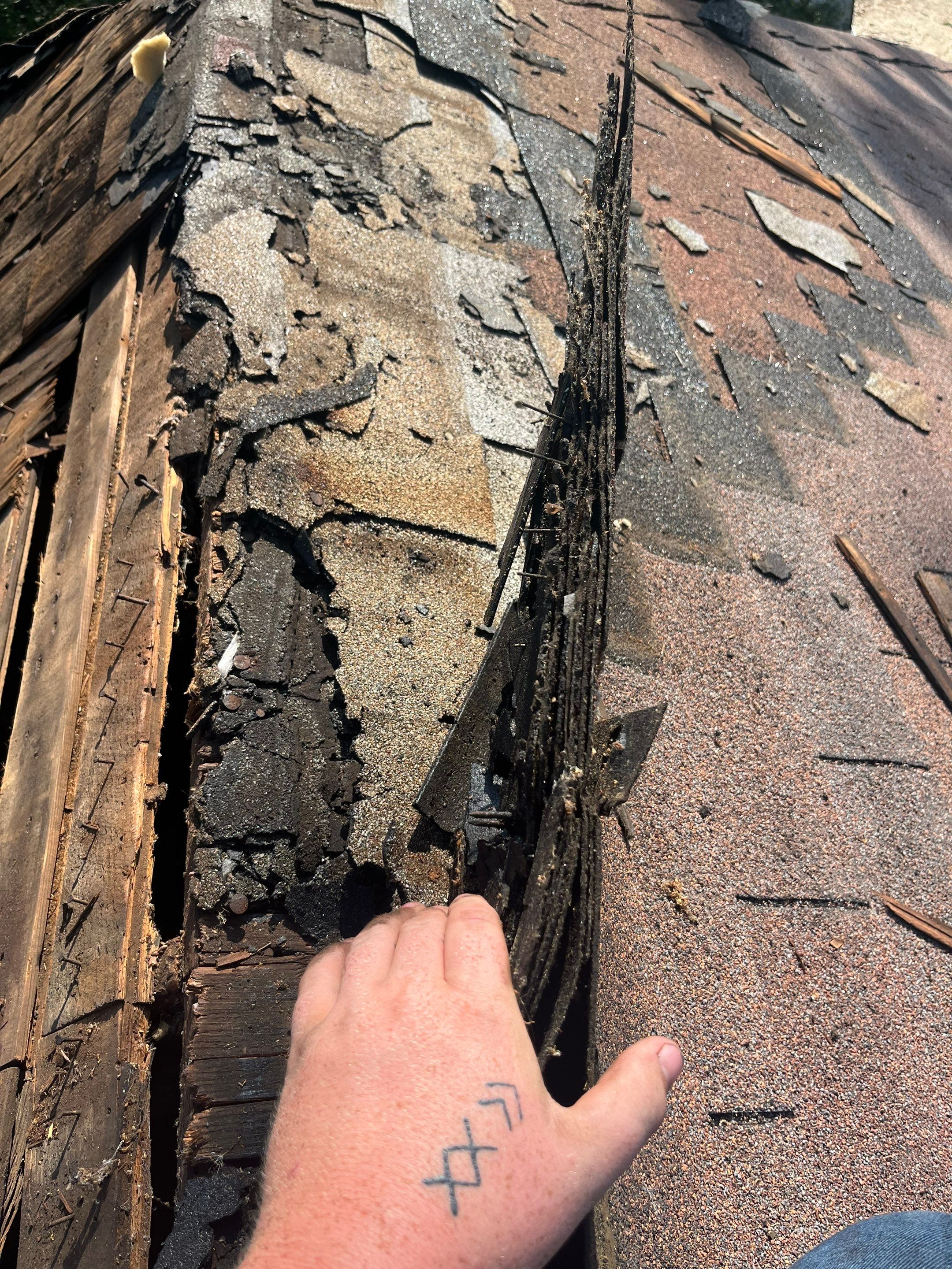 Residential Metal Roof Replacement using Reed's Metals: Colored Residental Panel (Burgundy) by Hostetler Roofing