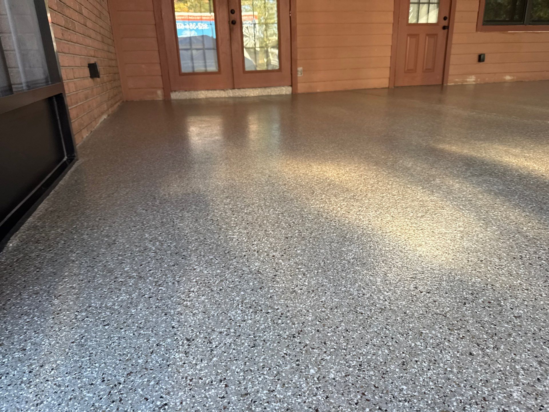 Porch in Lake City, FL in Pebble Beach by Cross Creek Concrete Coatings