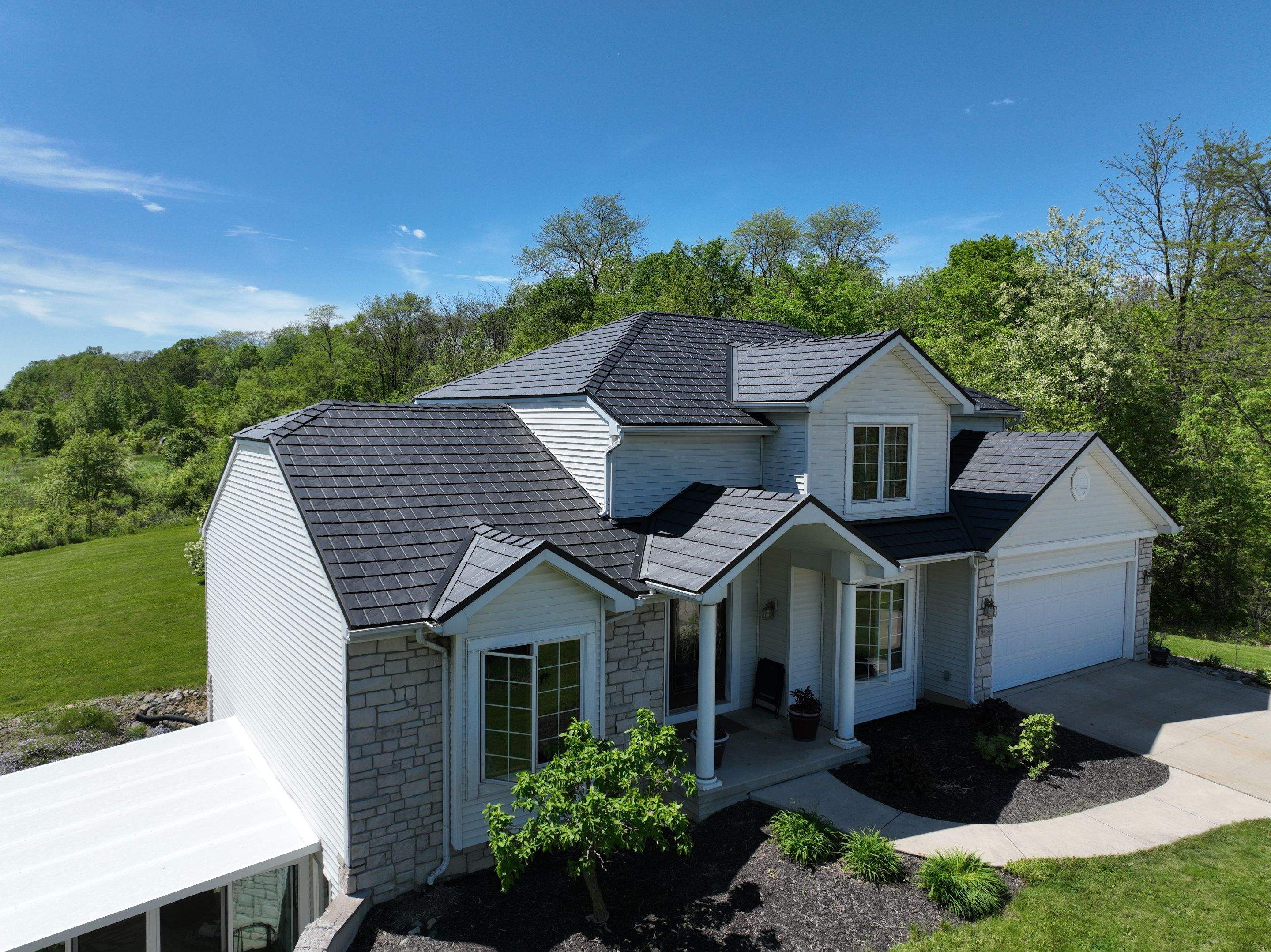 Residential Roofing Installation using Vic West Nothridge Slate by 4Ever Metal Roofing