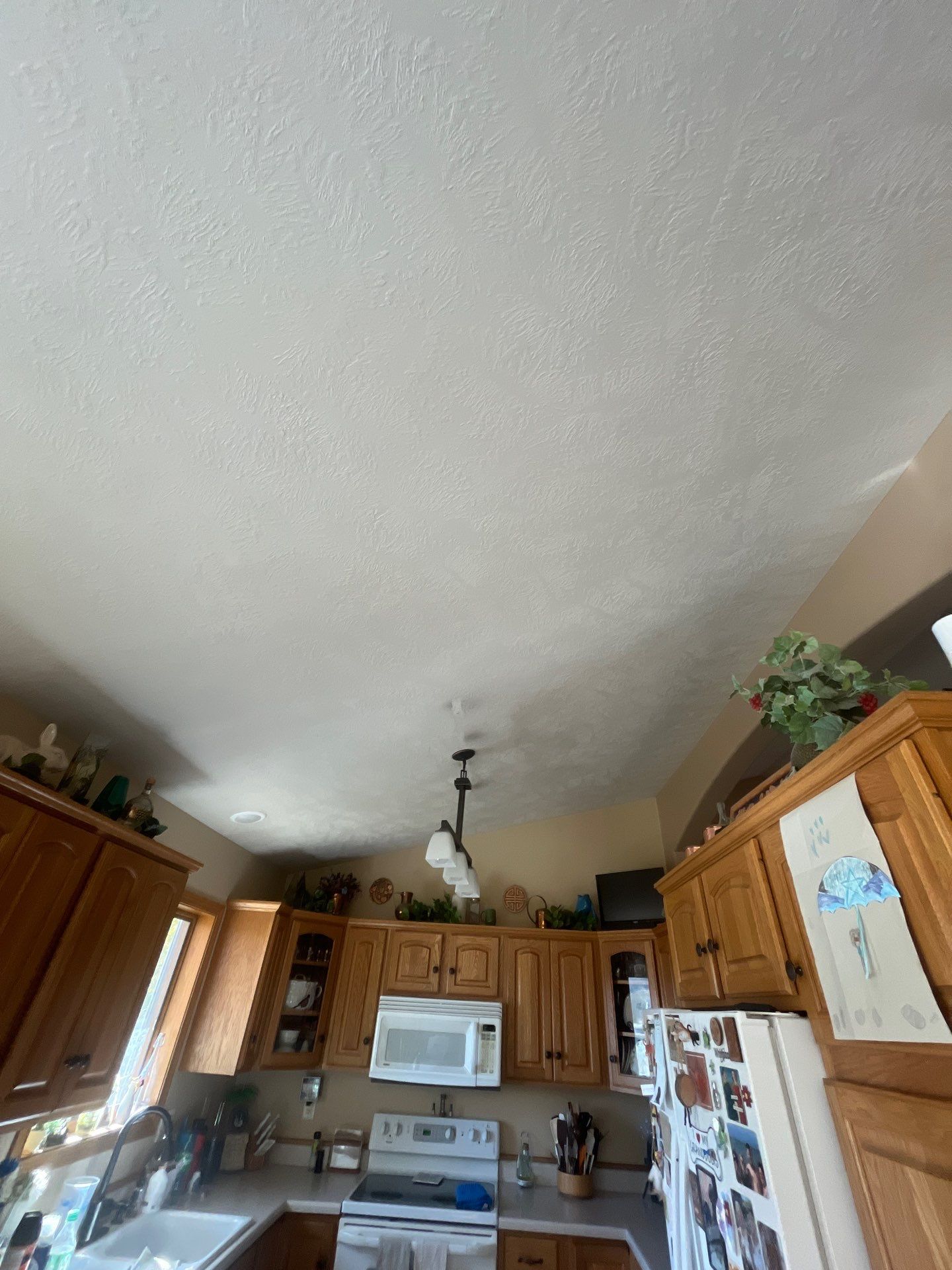 Interior Painting and Vaulted Ceiling Drywall Tape Repair in Sioux Falls by Select Painting, Coatings & Garage Cabinets