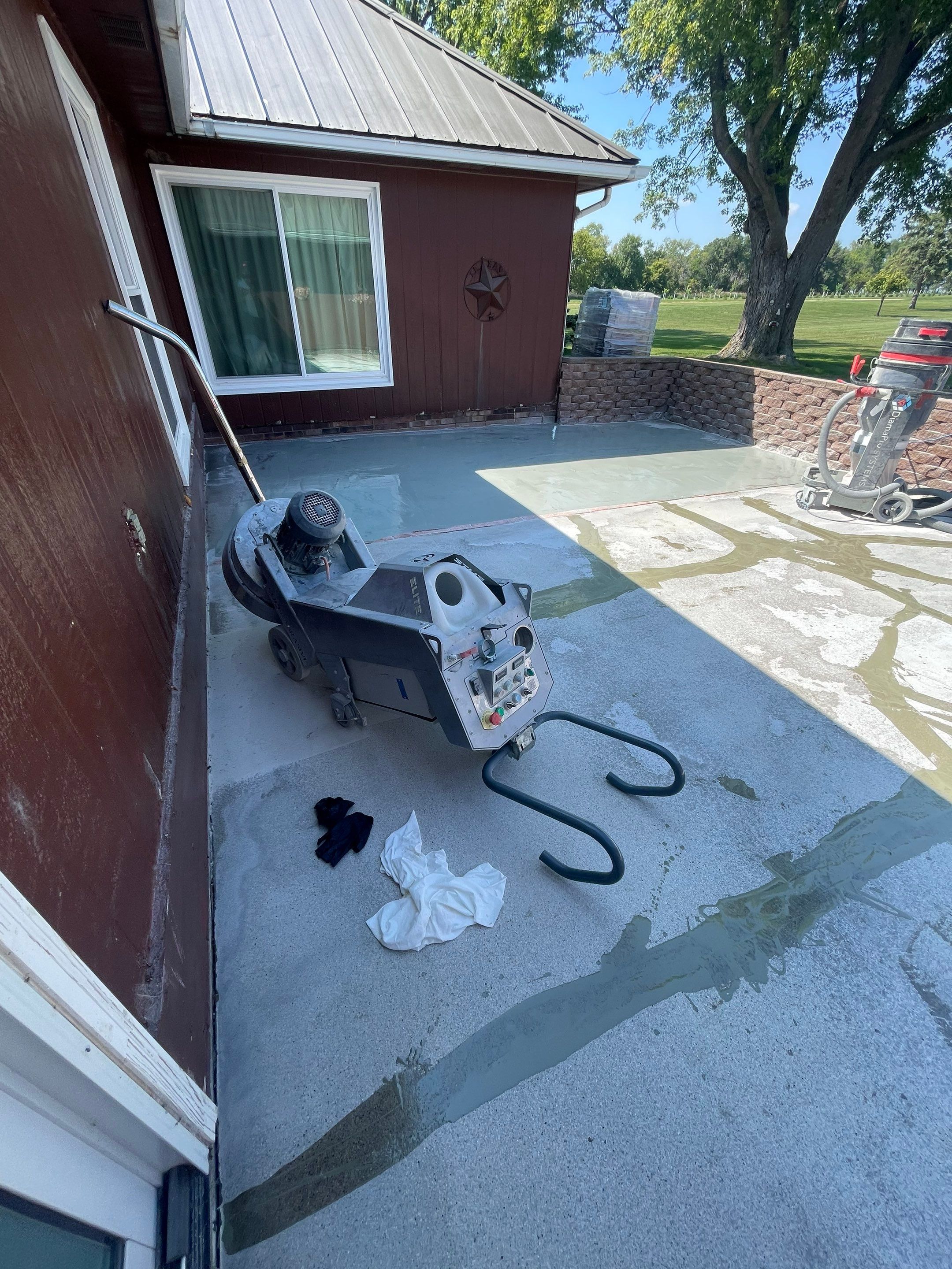 Concrete Patio Resurfacing and Protective Coating in Winfred, South Dakota by Select Painting, Coatings & Garage Cabinets