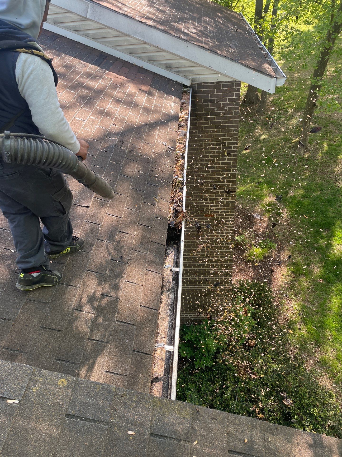 Commercial gutter cleaning Frederick, MD before photo with filled gutters
