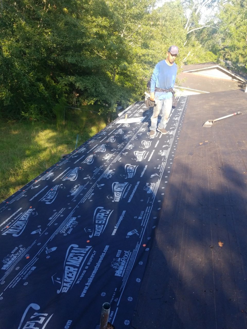 Residential Roofing Installation using Metal roofing by American Roofing & Construction LLC