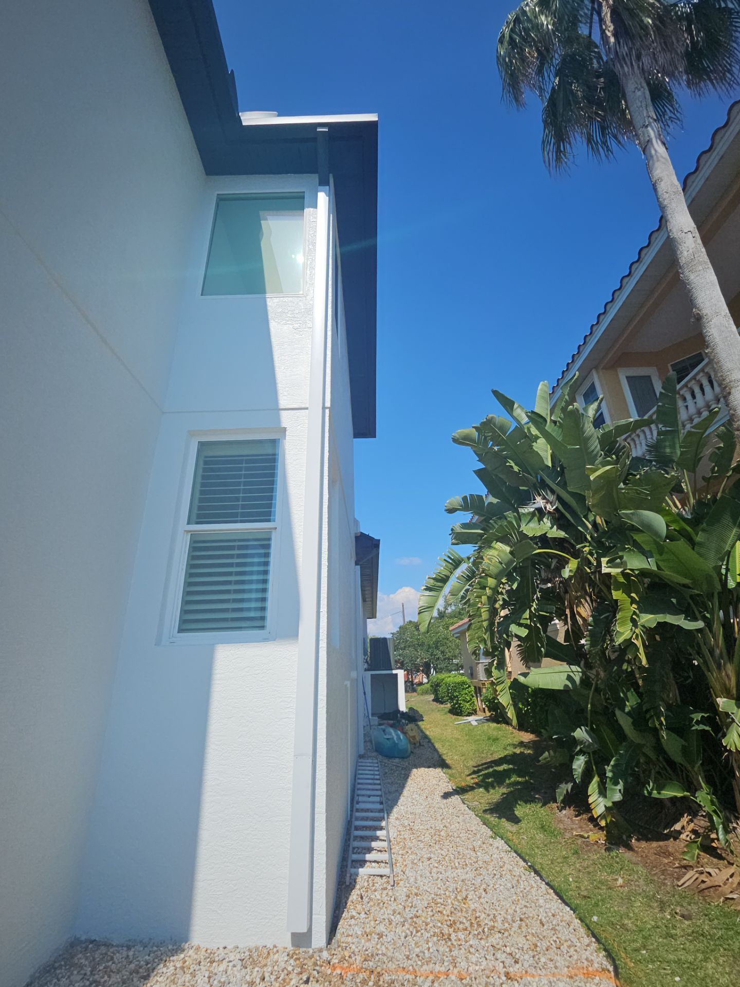 Soffit and Fascia Installation and black seamless gutters in Sarasota FL by Gutter Professors
