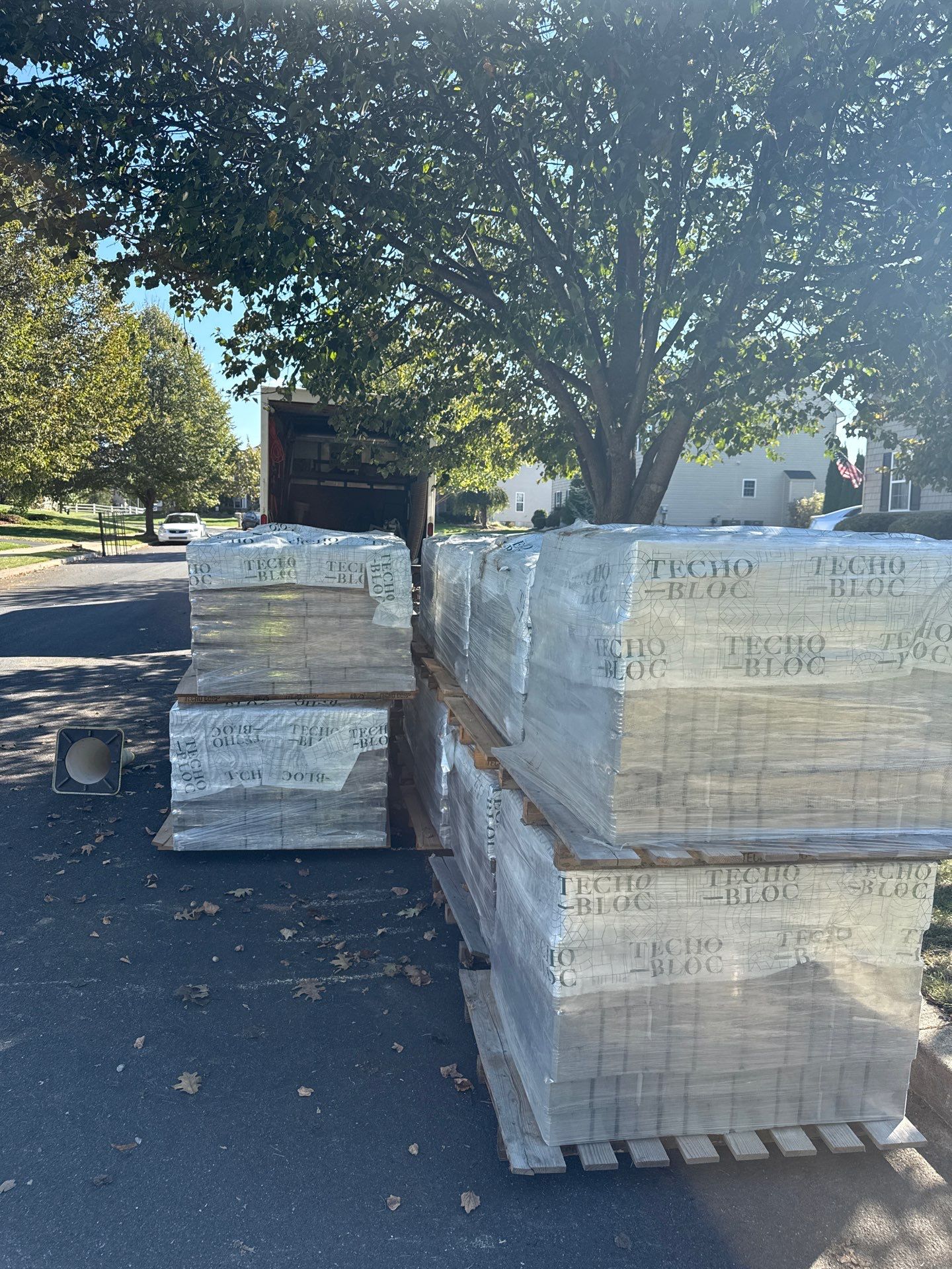 Backyard Retreat: Techo-Bloc Patio + Firepit Lounge by Saylor’s Lawn & Landscape