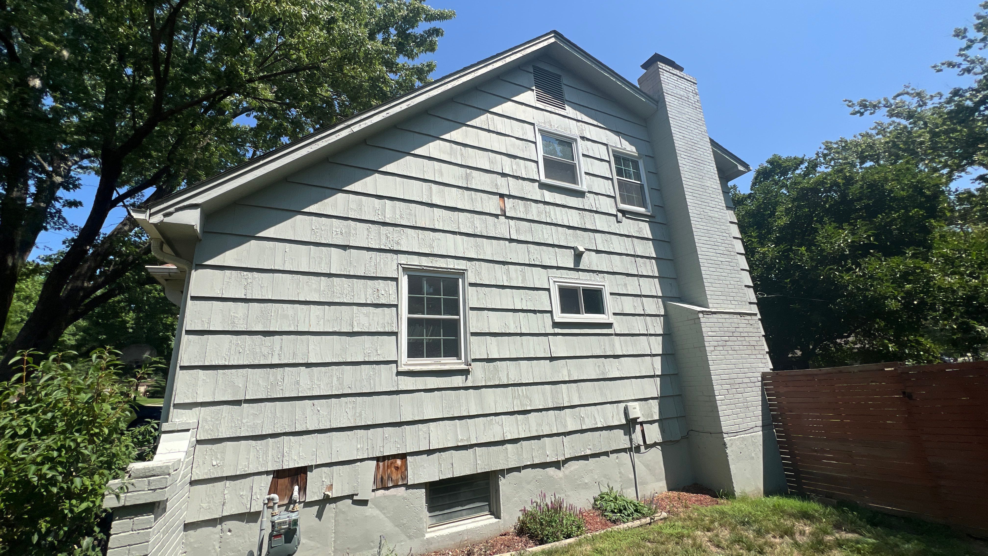 Complete Transformation: Stunning Exterior with cedar accents by Cougar Painting