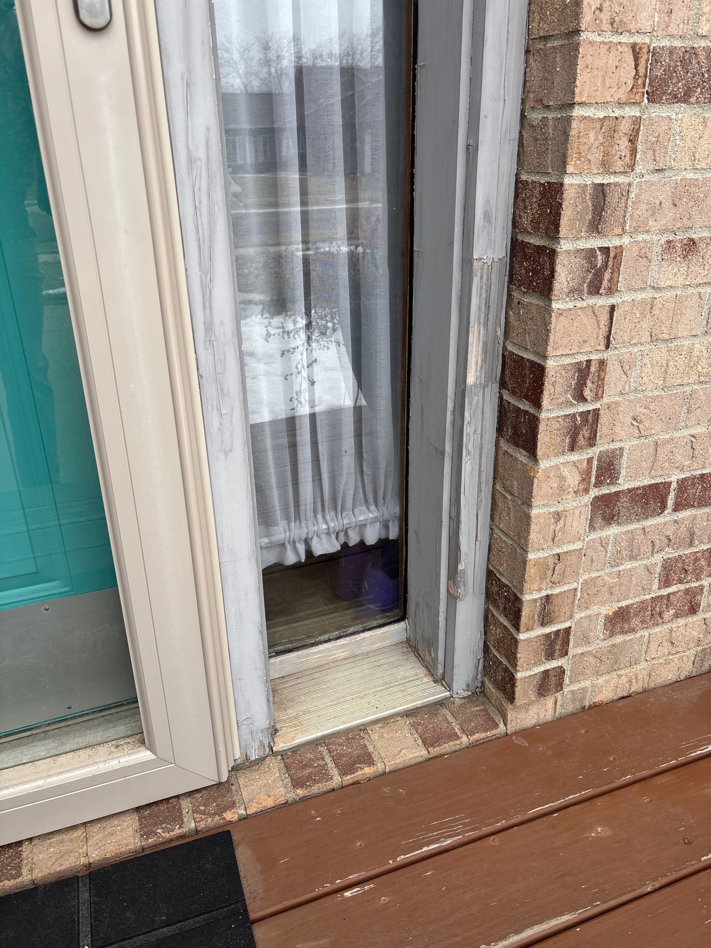Exterior Painting and Wood Trim Replacement in Sioux Falls by Select Painting, Coatings & Garage Cabinets