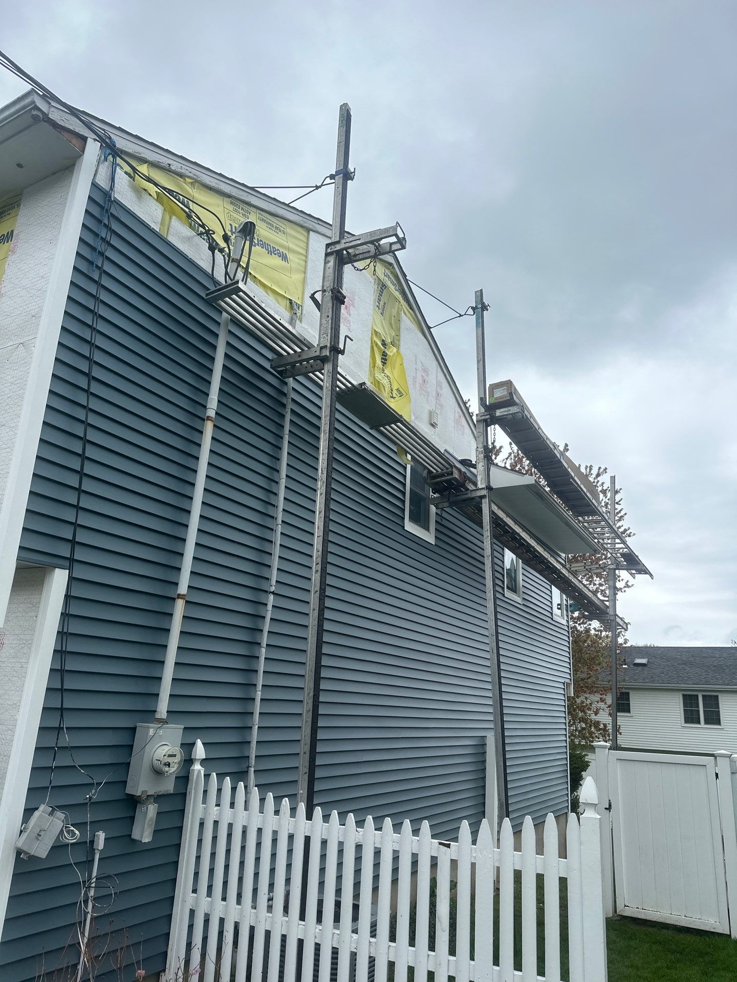 Siding Installation using Certainteed Cedar Impressions Straight Edge Perfection Shingles - D7 - Pacific Blue by A Plus Exterior