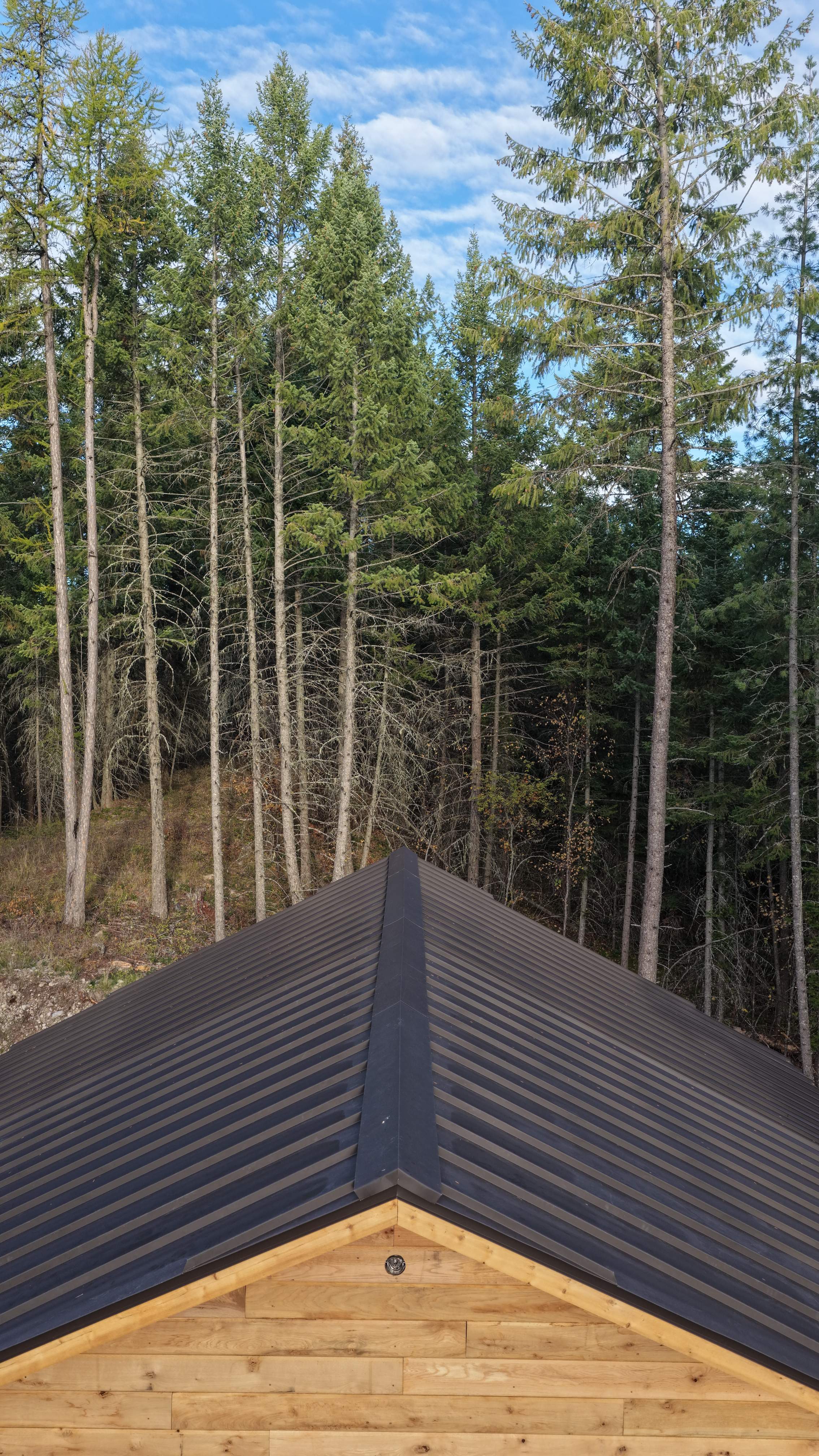 Mechanical Lock Standing Seam - CMG ULG Dark Bronze  by Montana Roofing Solutions