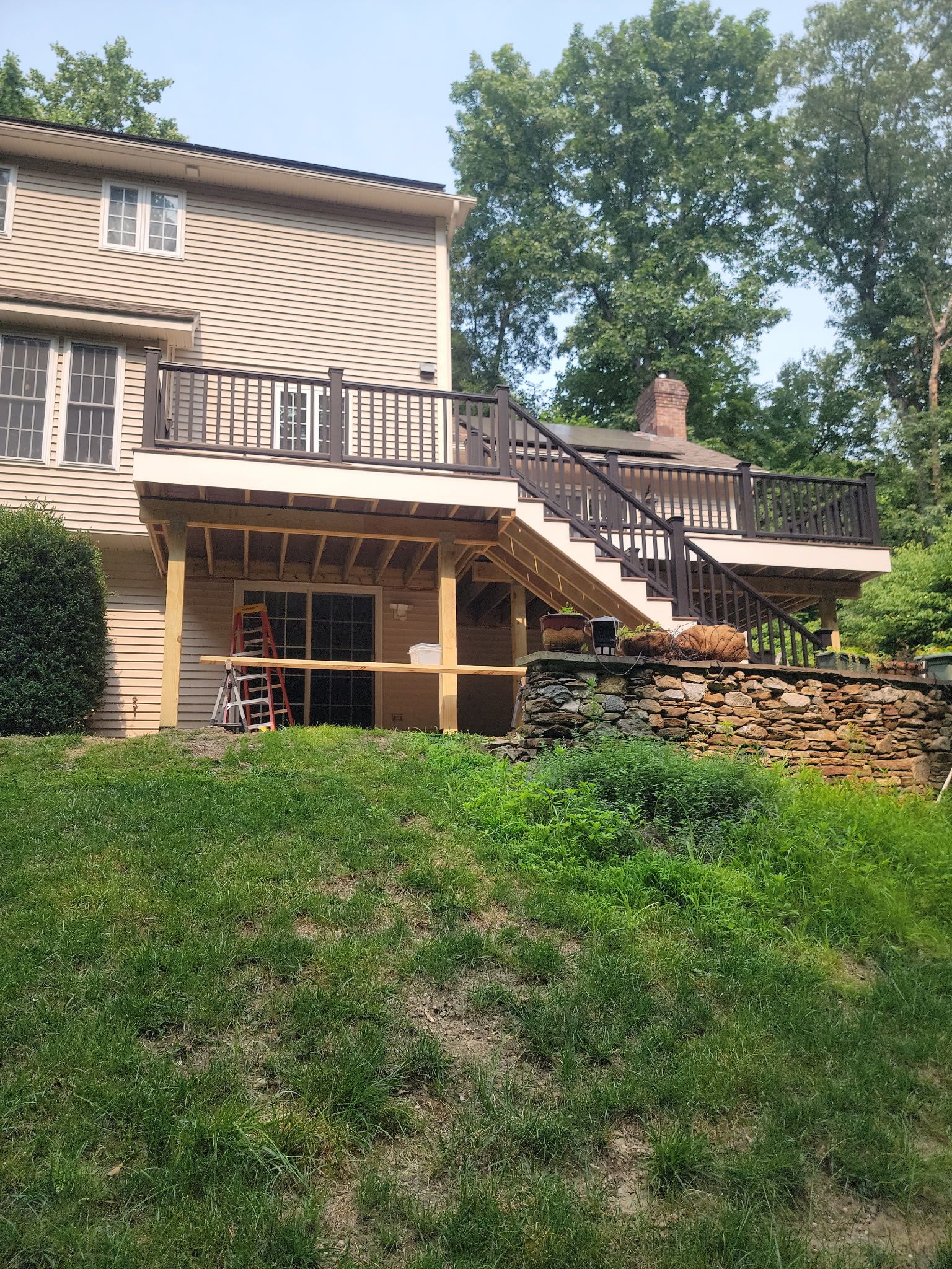 Deck Replacement, using Trex Select Whiskey Barrel and Transcend Railings in Black. by DiGiorgi Roofing and Siding Inc