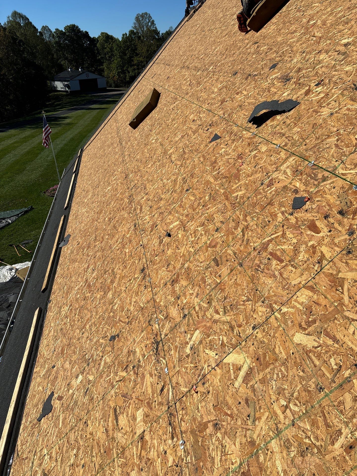 Residential Roofing Installation using GAF Timberline HDZ Charcoal by Rainstoppers Roofing