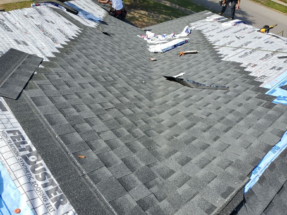 Residential Roofing Installation using Roof Replacement by American Roofing & Construction LLC