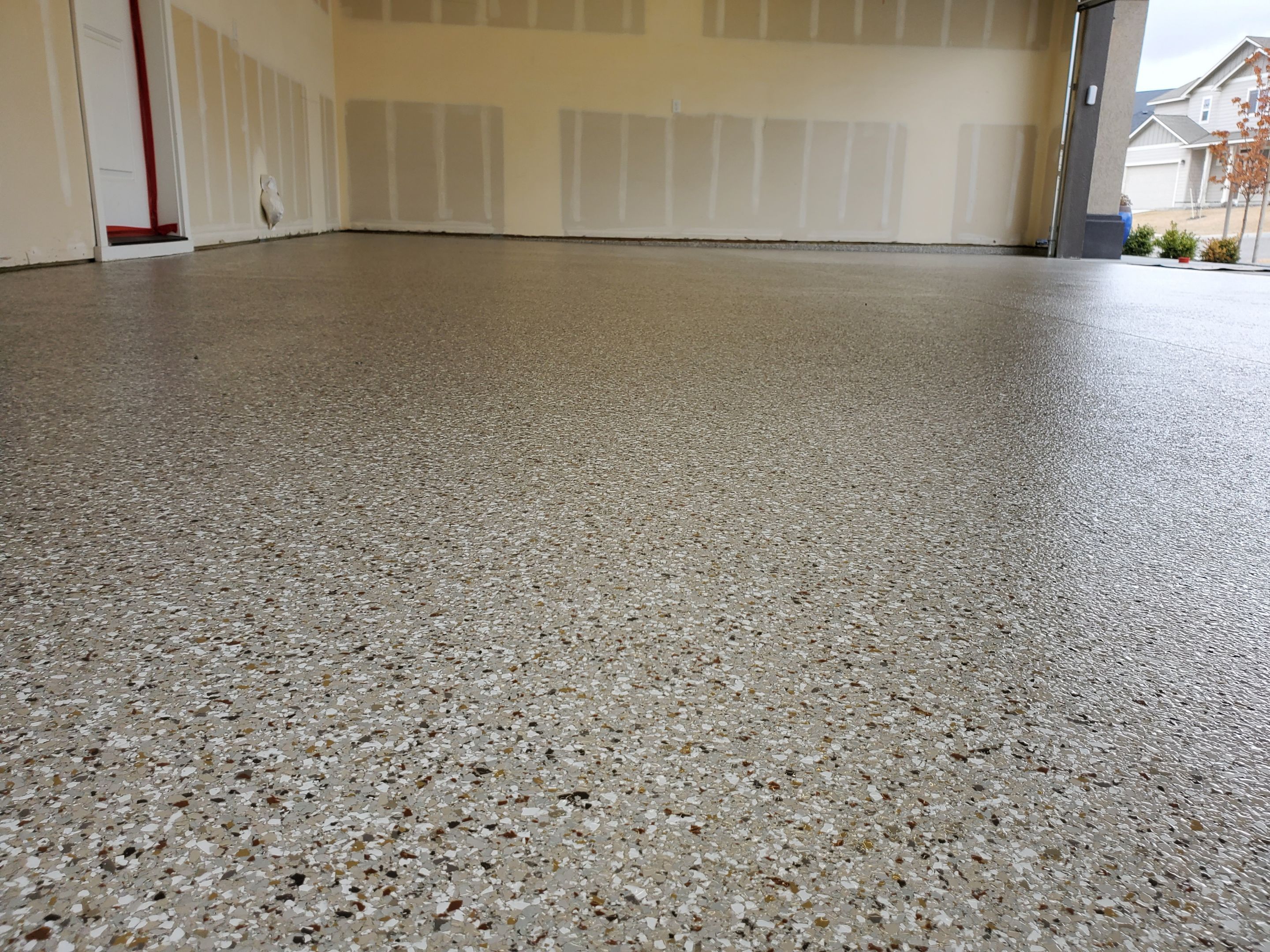 Garage Transformation using Pebble Beach by Croc Coatings, LLC