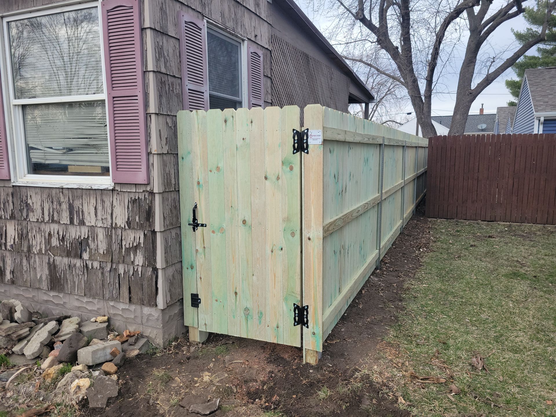 Custom Wood Privacy Fence and Gate Installation in Waterloo by Perfect Picket Fence and Stain