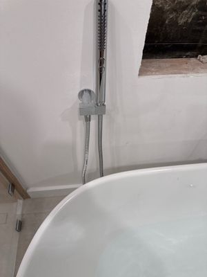 Installing New Piping, Under-Sink Piping, and New Tub with Piping