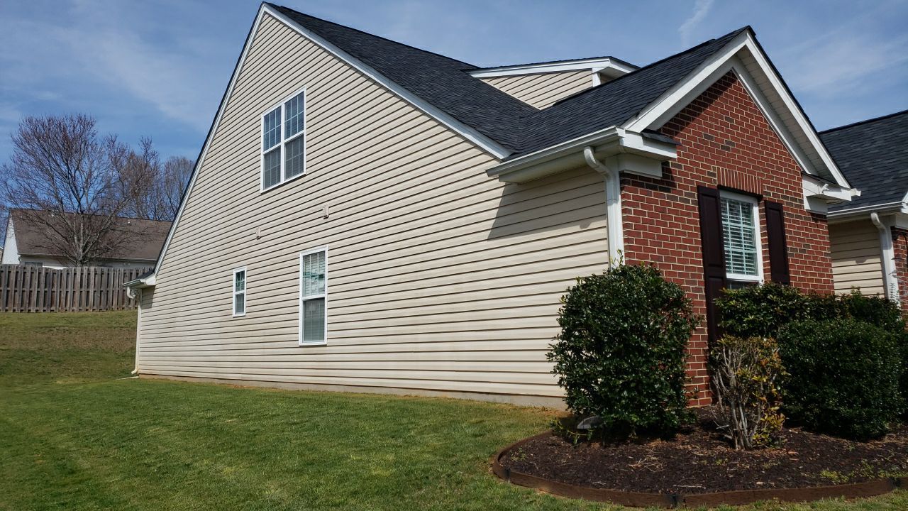 House Wash using cleaner by Power Wash Masters LLC