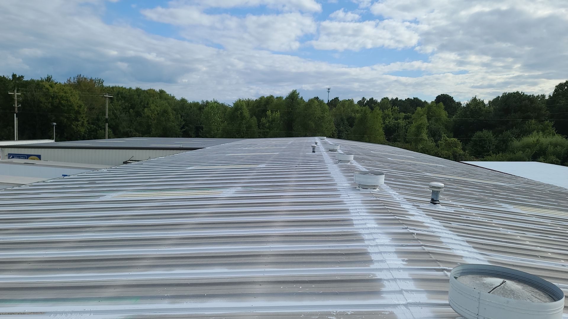 Commercial Metal Restoration System using Aldocoat Coatings by Hostetler Roofing