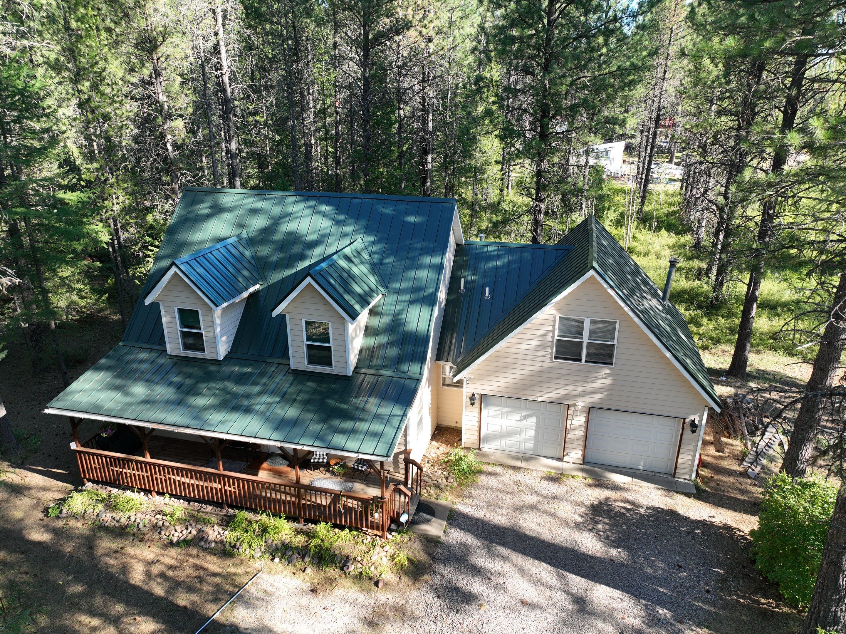 Green Snap Lock Standing Seam  by Montana Roofing Solutions