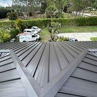 24ga 1.5" Mechanical Seam Dark Bronze by Total Roofing System The Metal Roof Experts