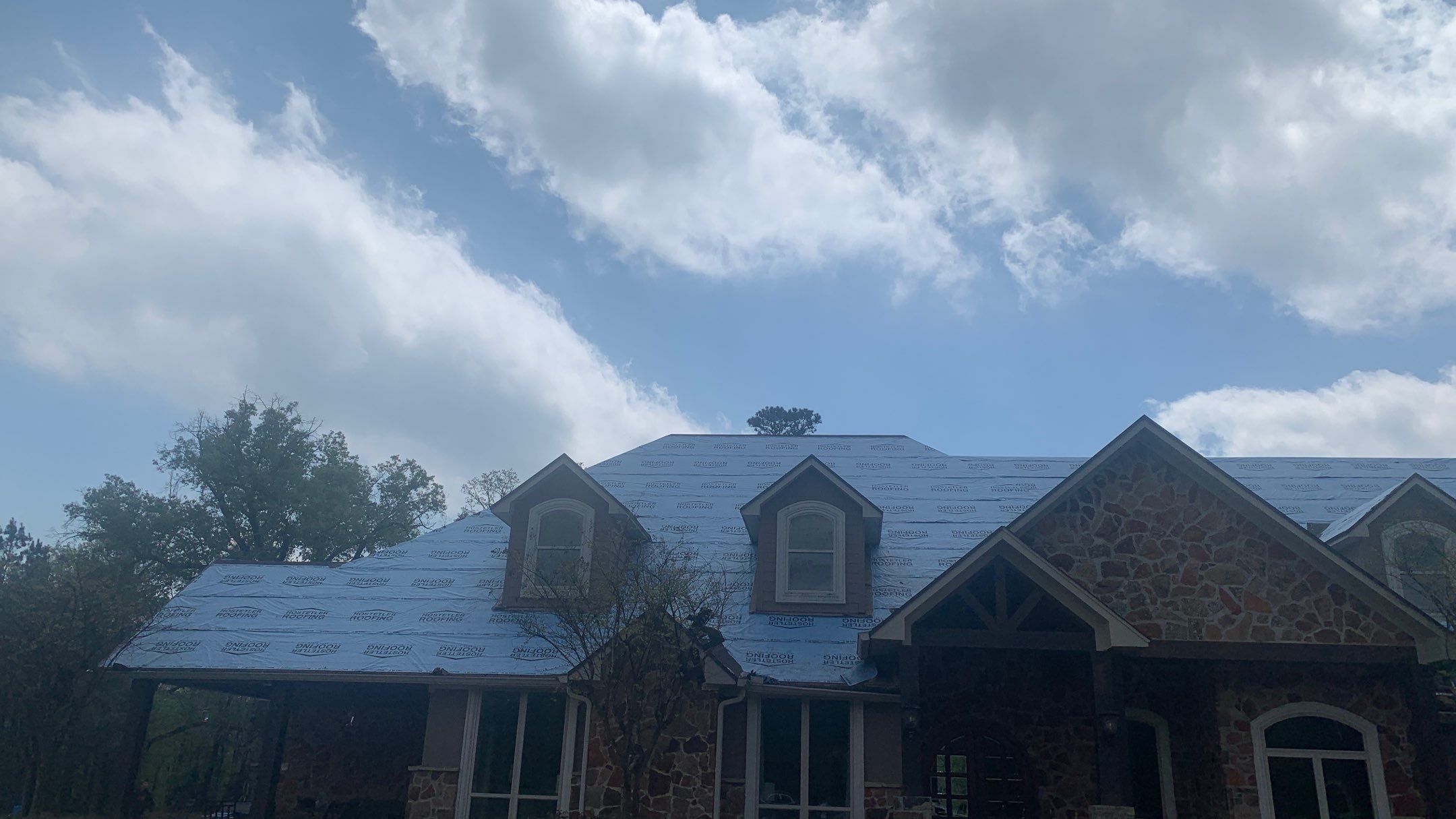Residential Roofing Installation using Malarkey Architectural Vista Shingles by Hostetler Roofing
