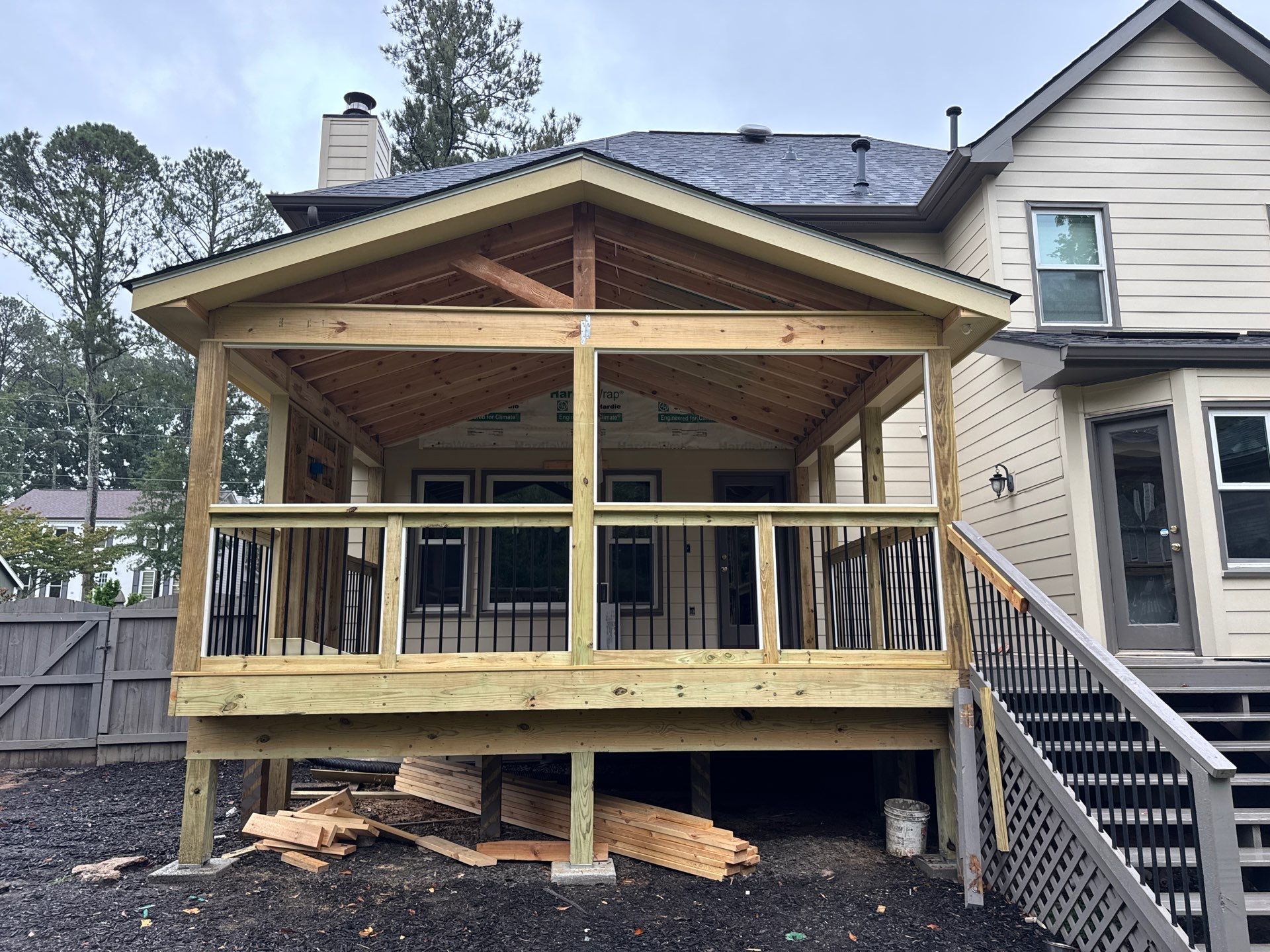 Custom Multi-Level Composite Deck and Screened-In Porch in Marietta by Swift Home Renovations