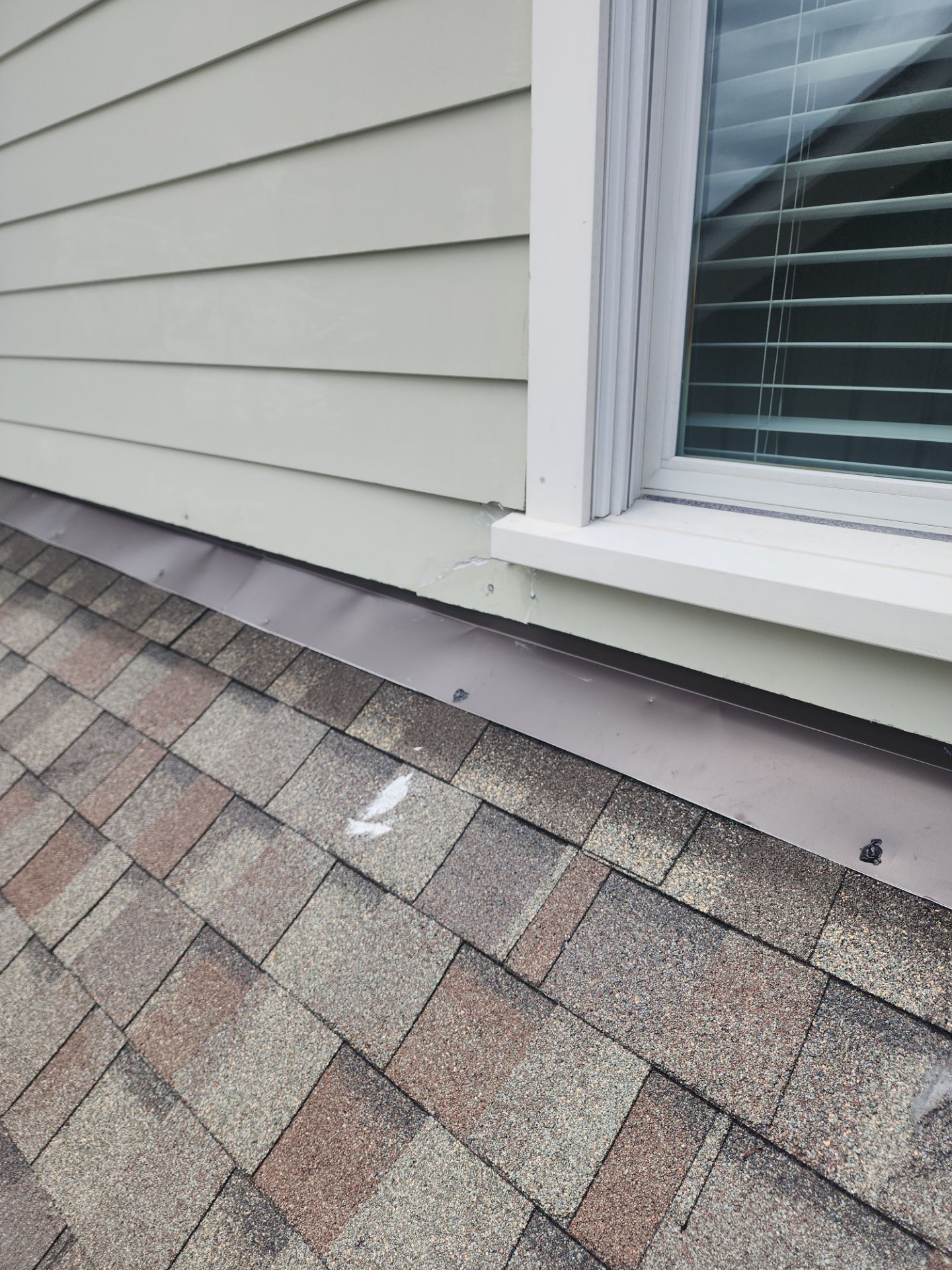 Flashing and siding repair by Indigo State Roofing
