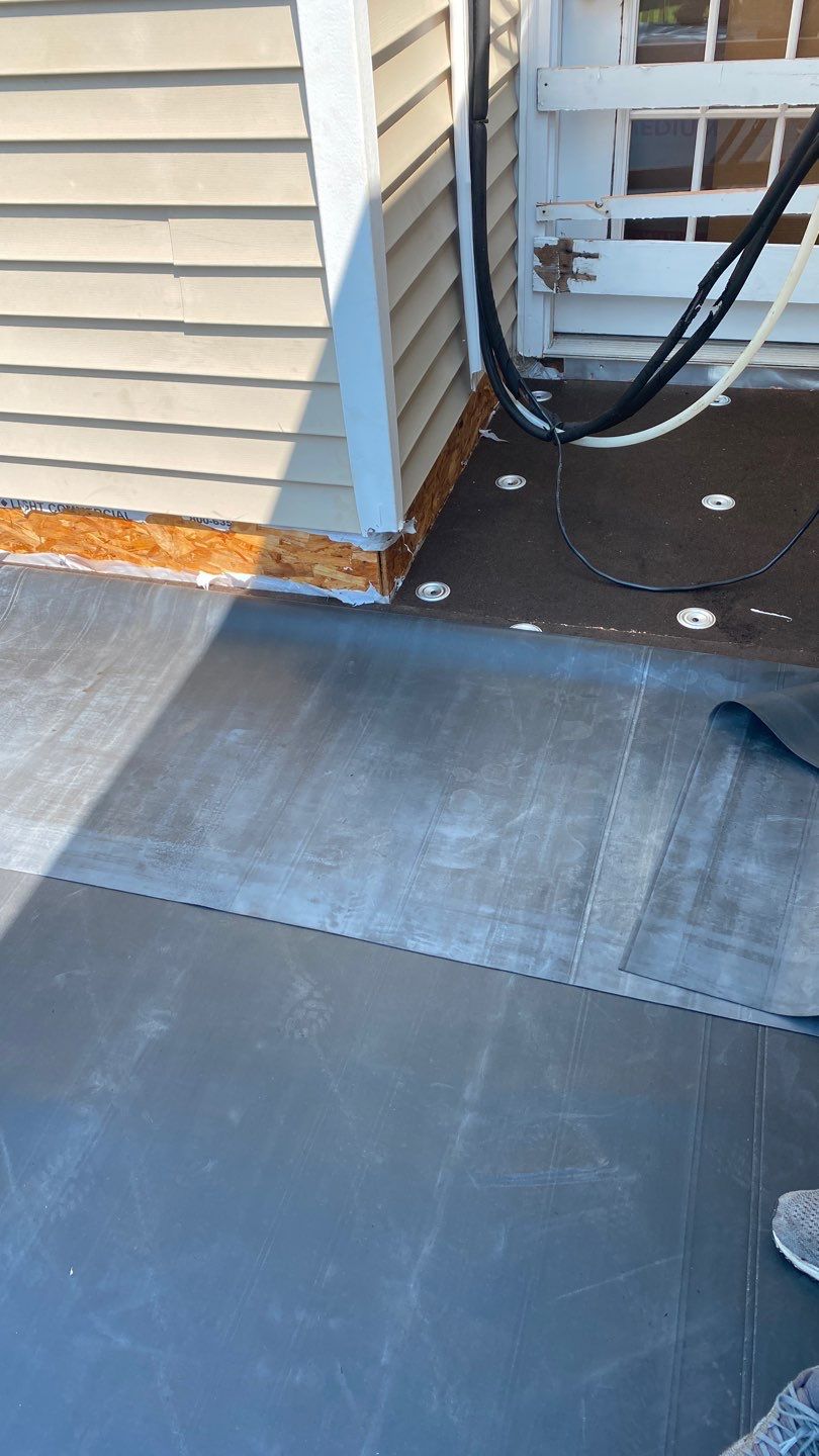 Siding Repair using Certainteed Mainsteet D4 and EPDM roof under deck by A Plus Exterior