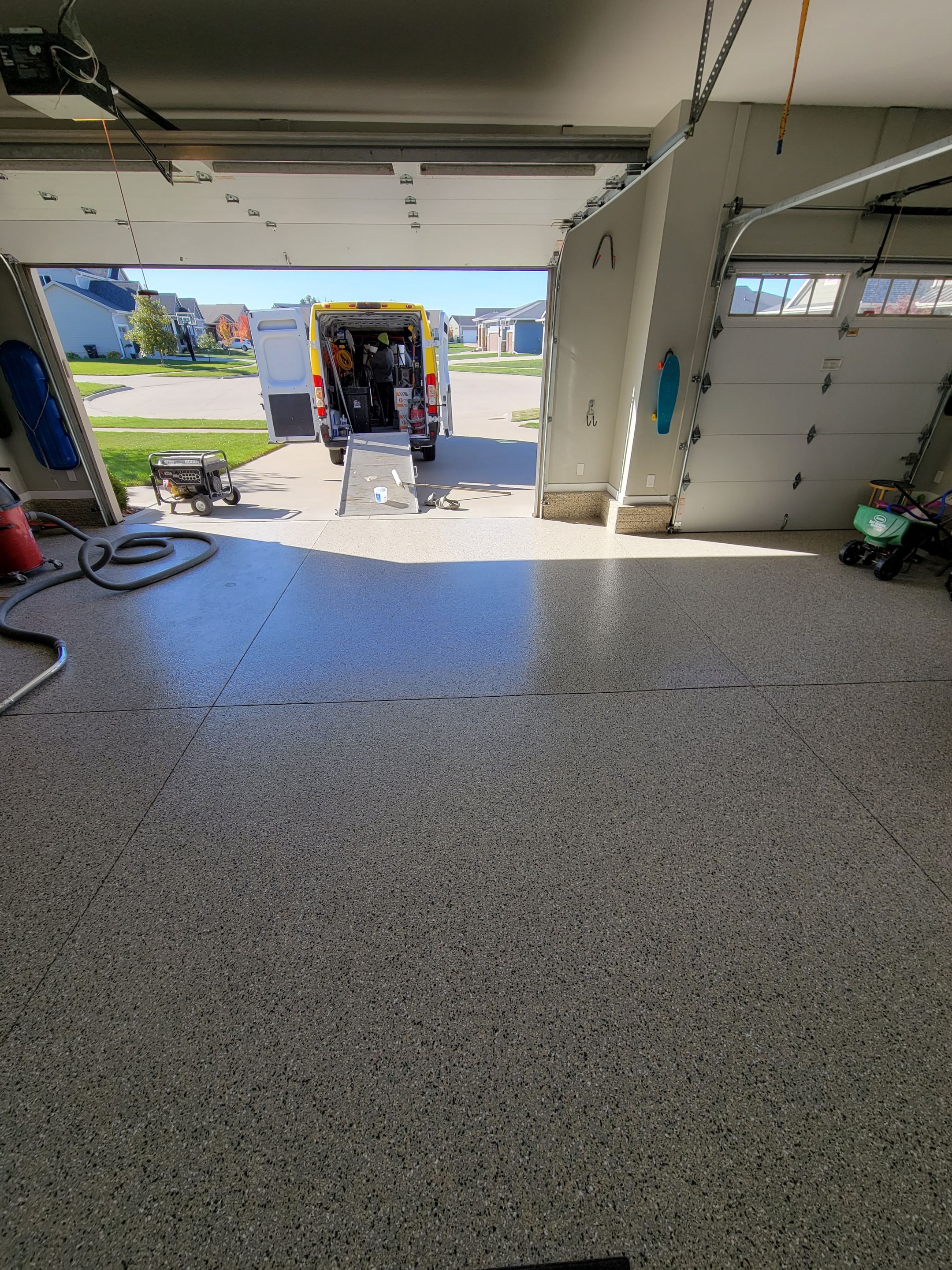 Grimes, IA Transformation: Professional Grade Garage Floor Coating by Revival Concrete Coatings