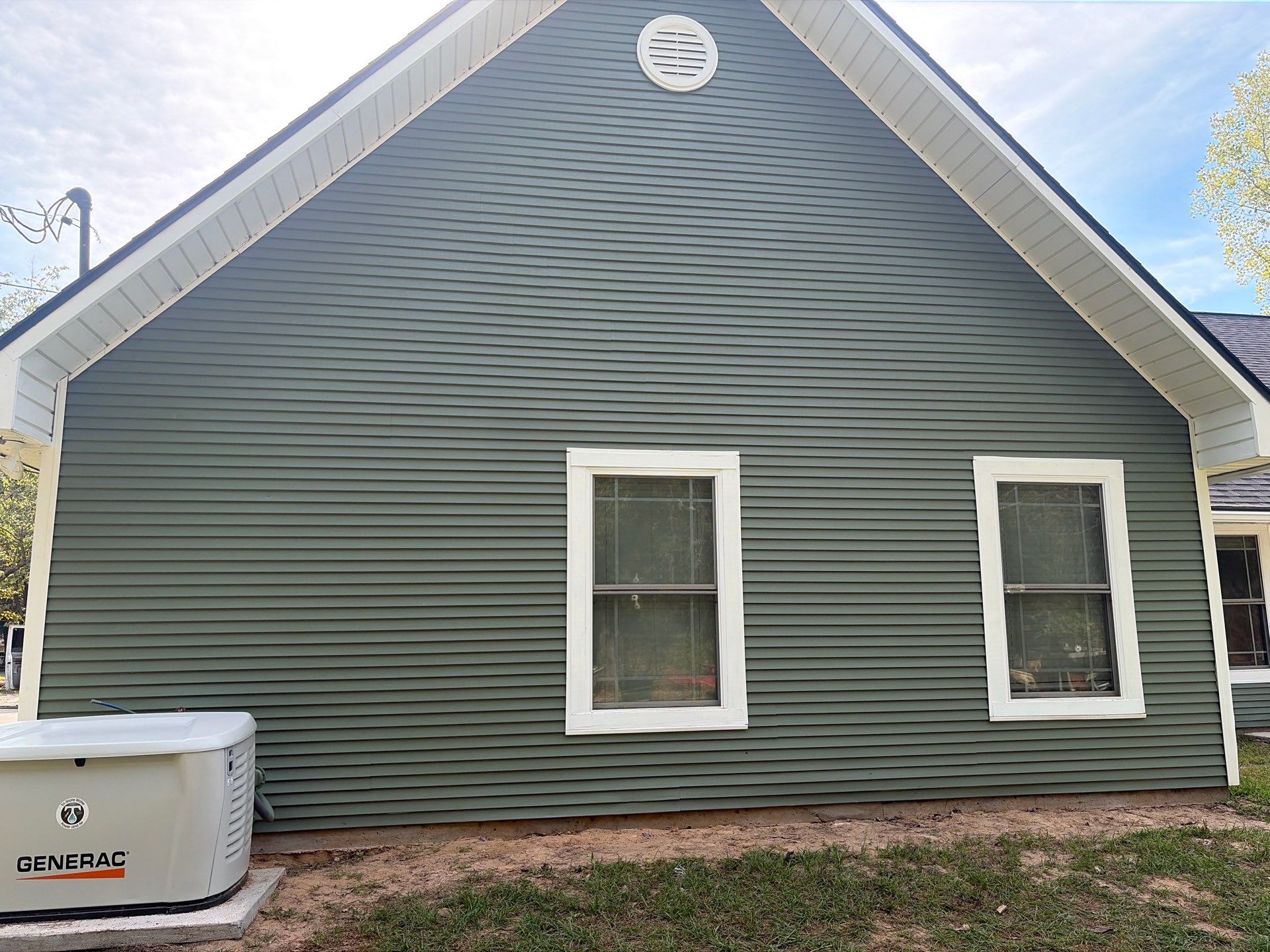 From Aged Yellow to Fresh Green in Frankston, Texas by Quality Coats Painting