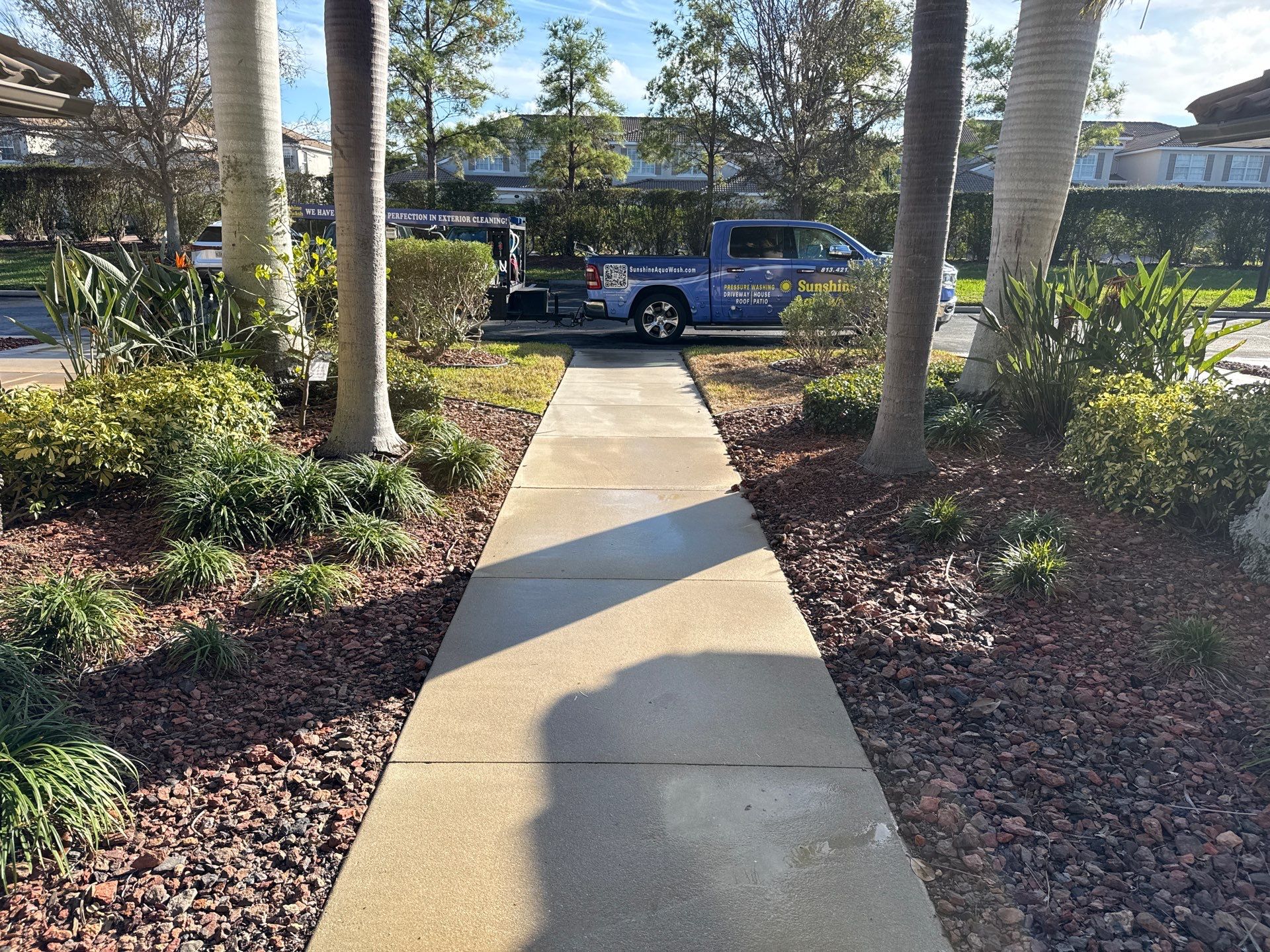 HOA Condo Concrete Driveway & Sidewalk Cleaning – River Strand Community, Bradenton, FL by Sunshine AquaWash