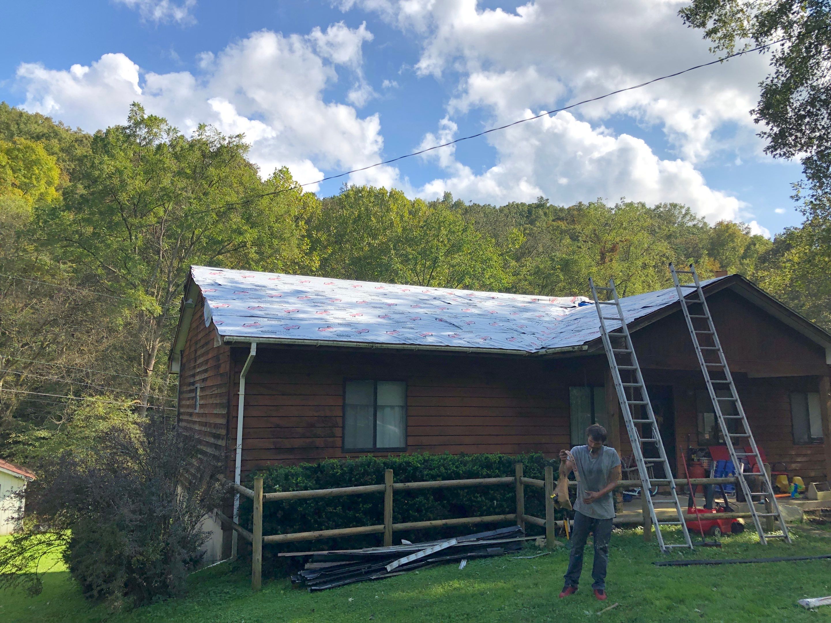 Metal Roof and Vinyl Siding, Soffit, Gutters using LifeTite Premium metal roofing  by Secure Construction Company Inc