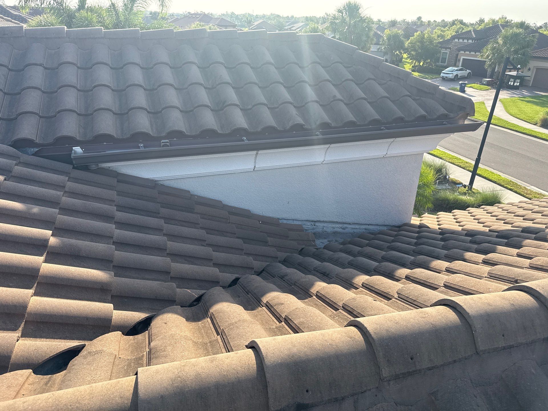 Soft Wash Roof Cleaning – Concrete Tile Roof | Artisan Lakes Esplanade, Palmetto, FL by Sunshine AquaWash