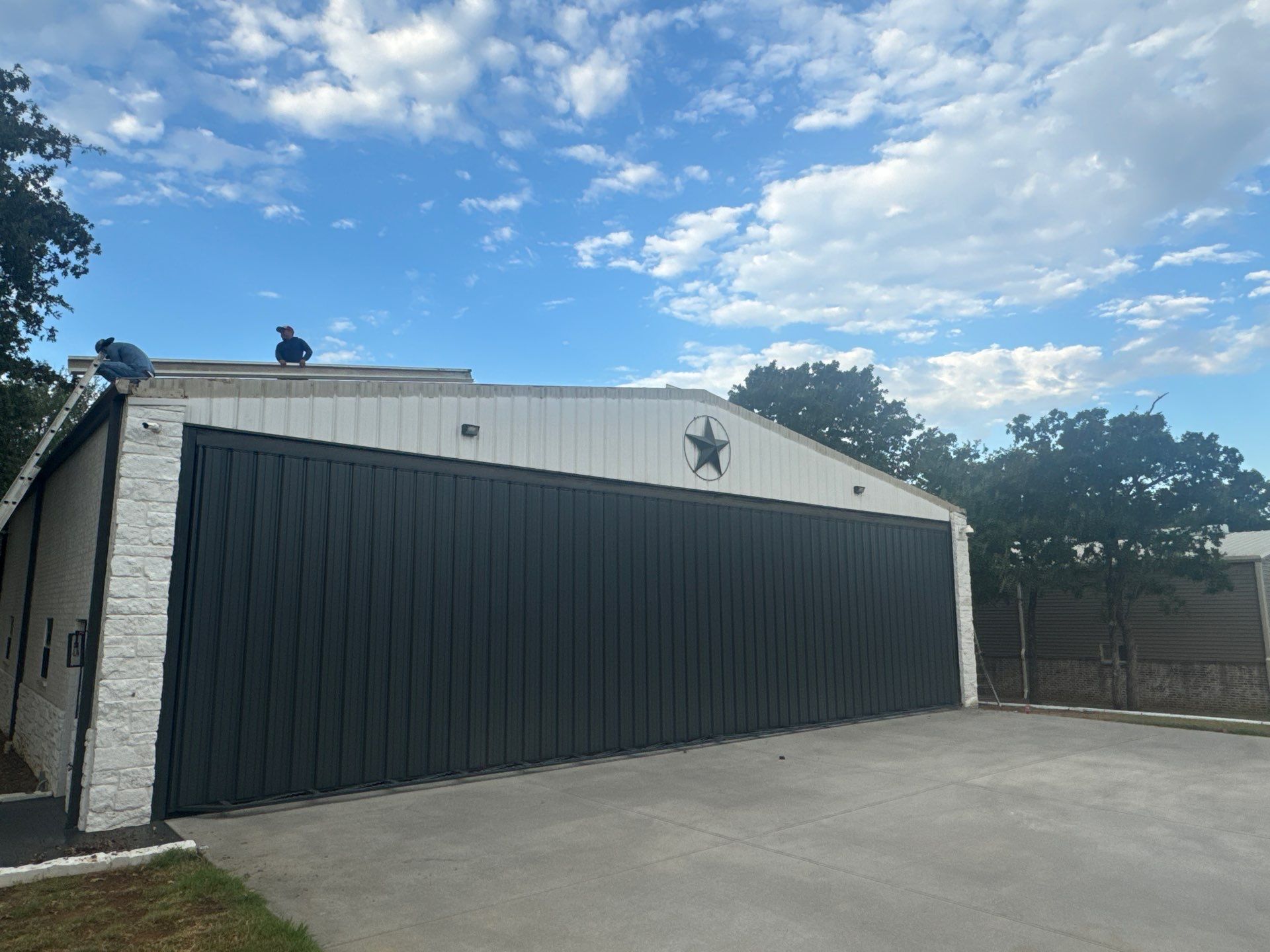 R-Panel Replacement by First Out Roofing 
