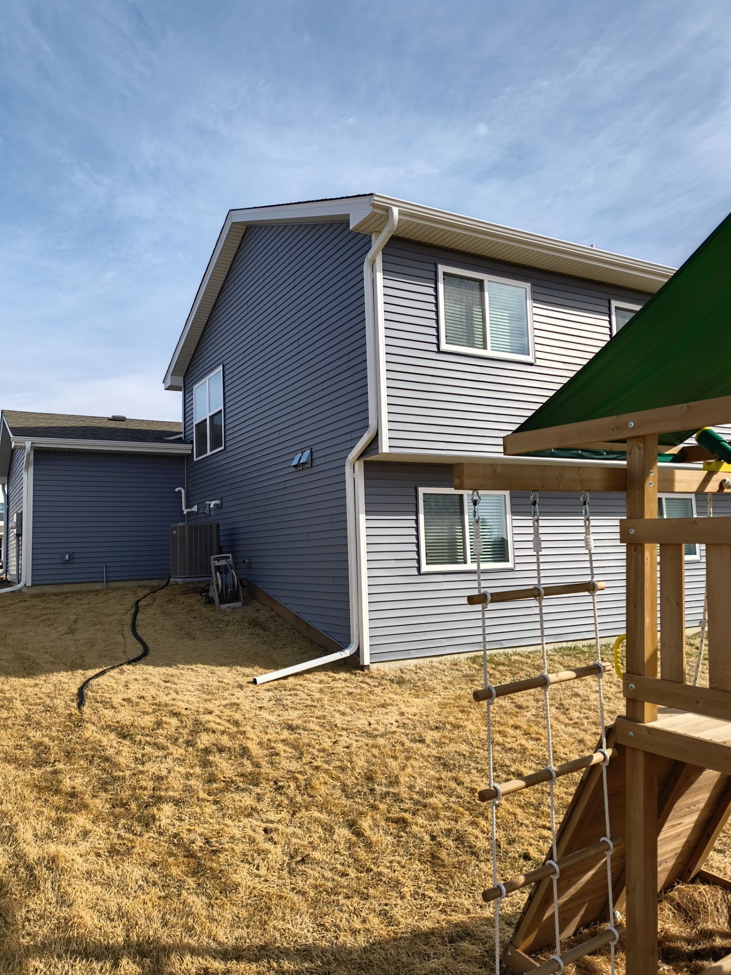 Seamless Gutter and Downspout Installation for Monticello Residential Property by Next Level Seamless Gutters / Exteriors Inc.