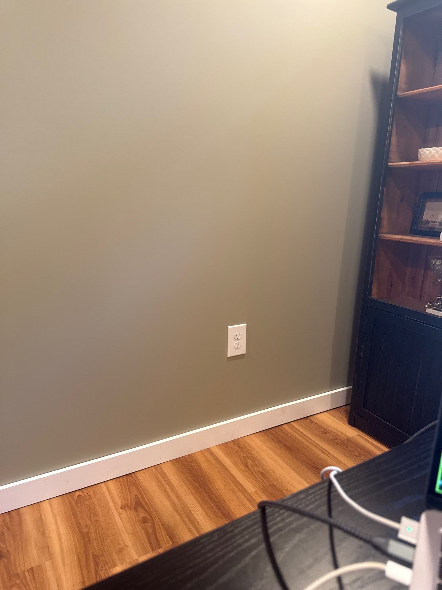 Lincoln Interior Renovation Featuring Sage Green Walls and Laminate Flooring by CompanyCam Sales Demo