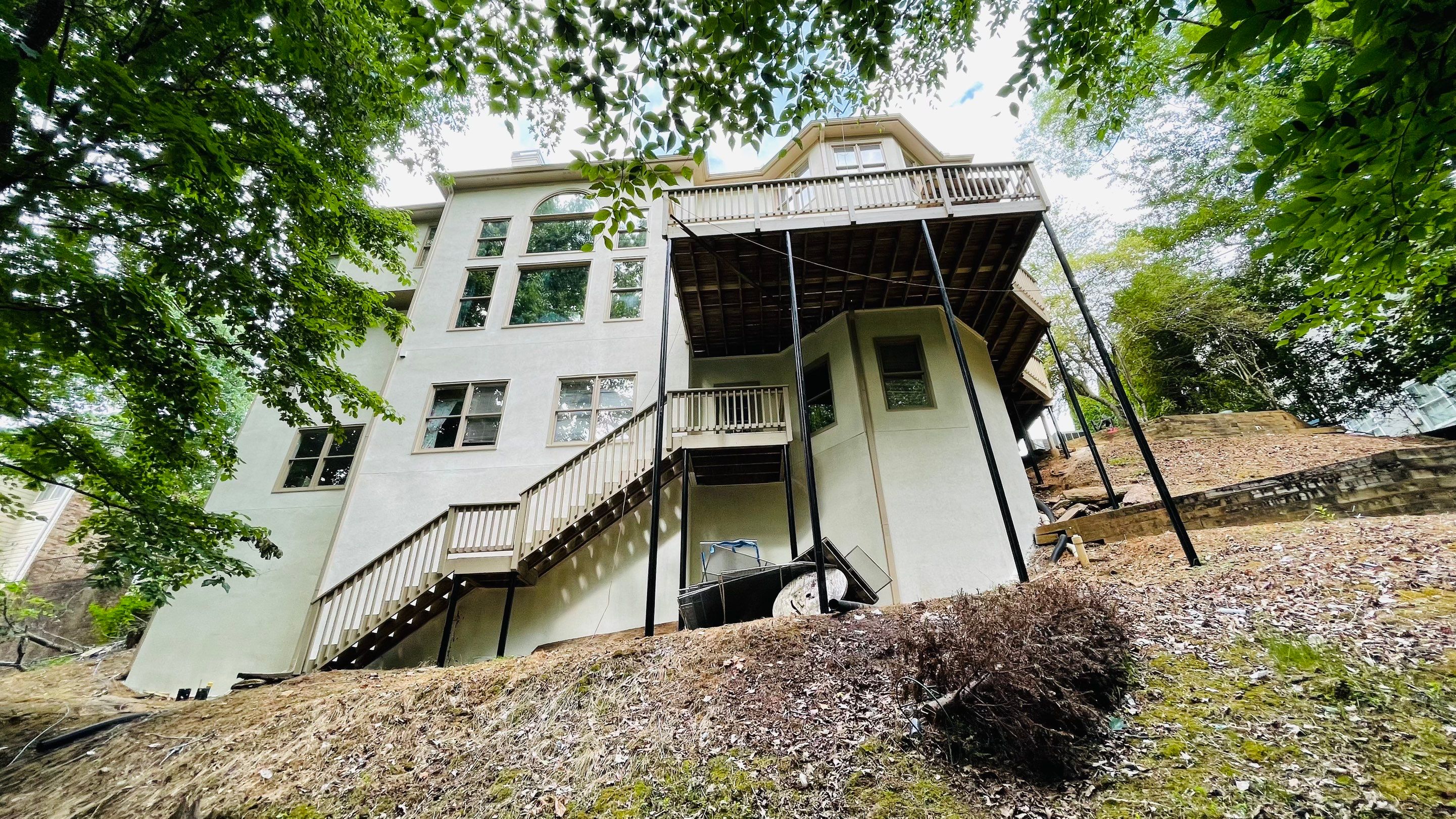 Stucco Exterior Painting and Deck Refinishing in Duluth by Swift Home Renovations