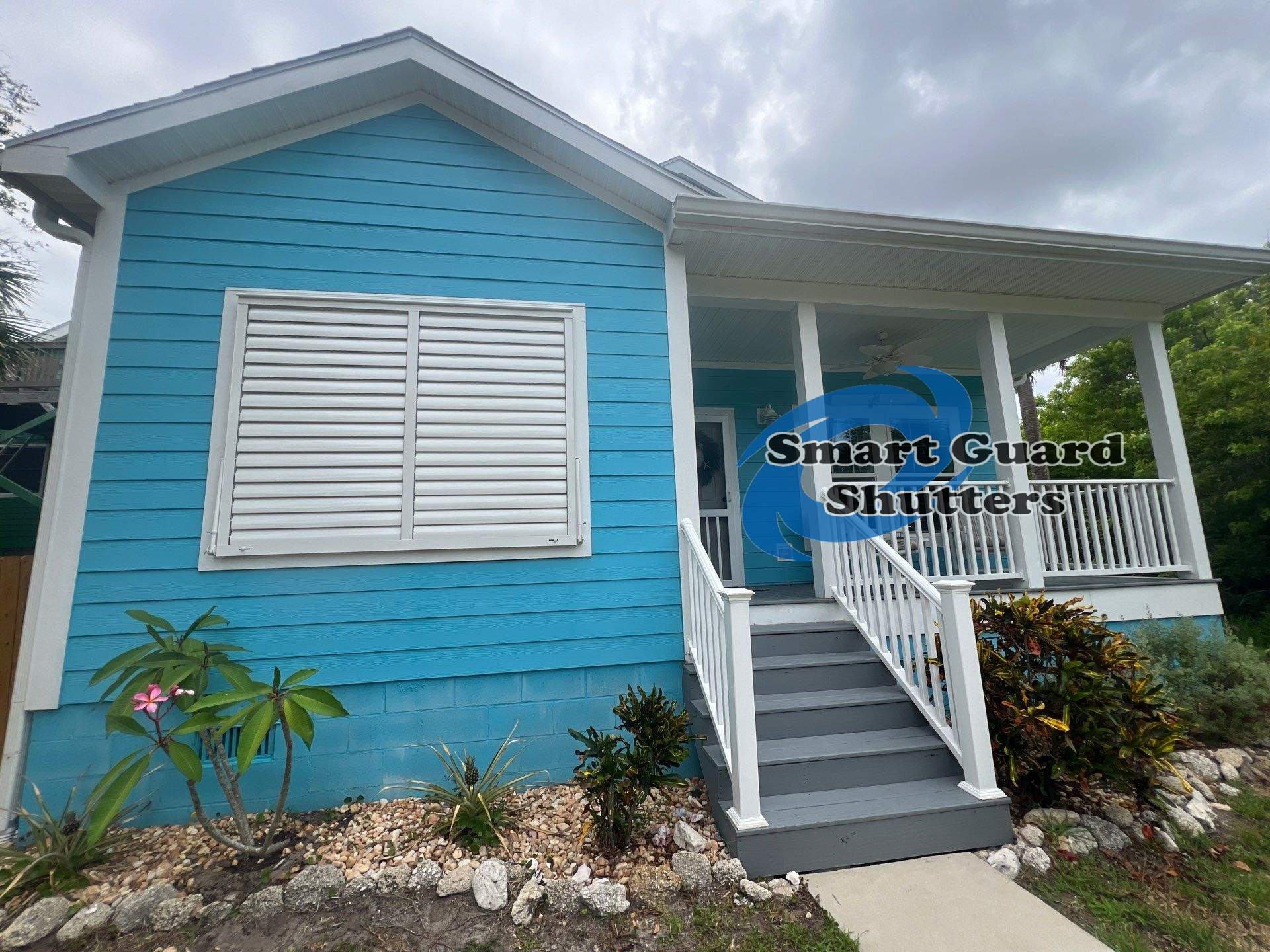 Impact Bahama Shutter in Signal White by Smart Guard Shutters