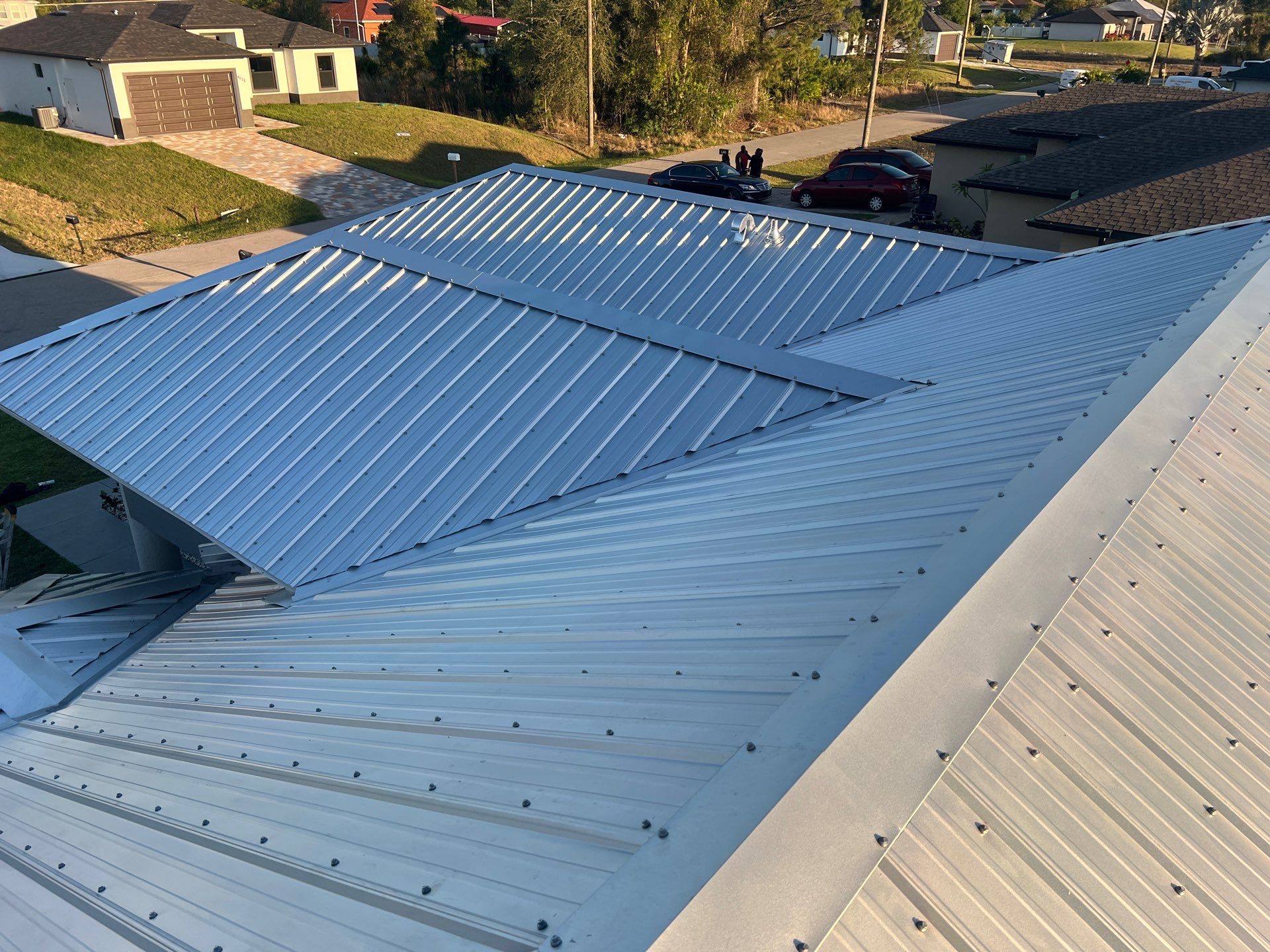 Residential Roofing Installation using Durabull Classic Rib Panel by Durabilis Roofing INC