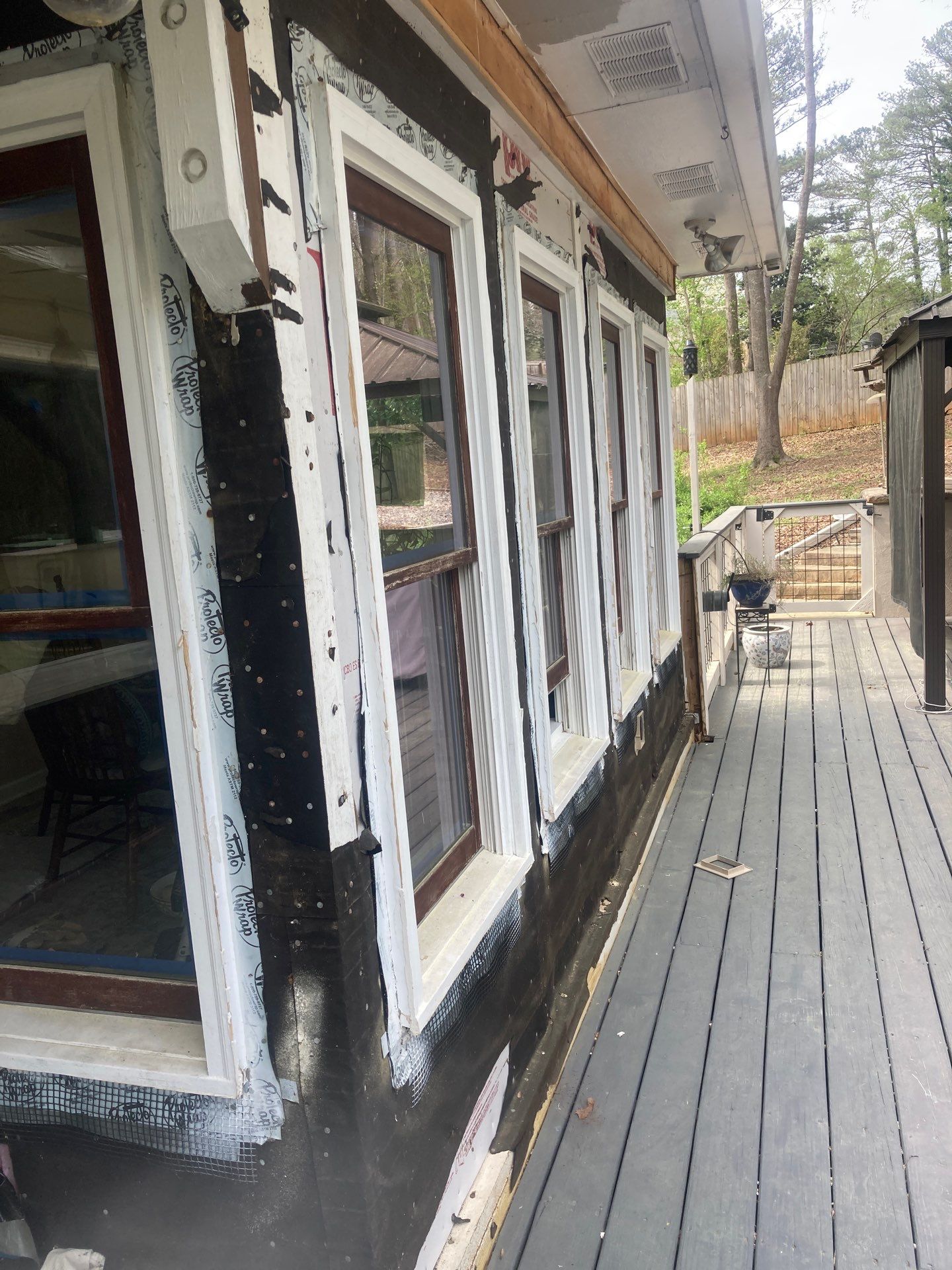Window, Siding, & Rotten Wood Replacement with Exterior Painting in Woodstock, GA by Nelson Exteriors 