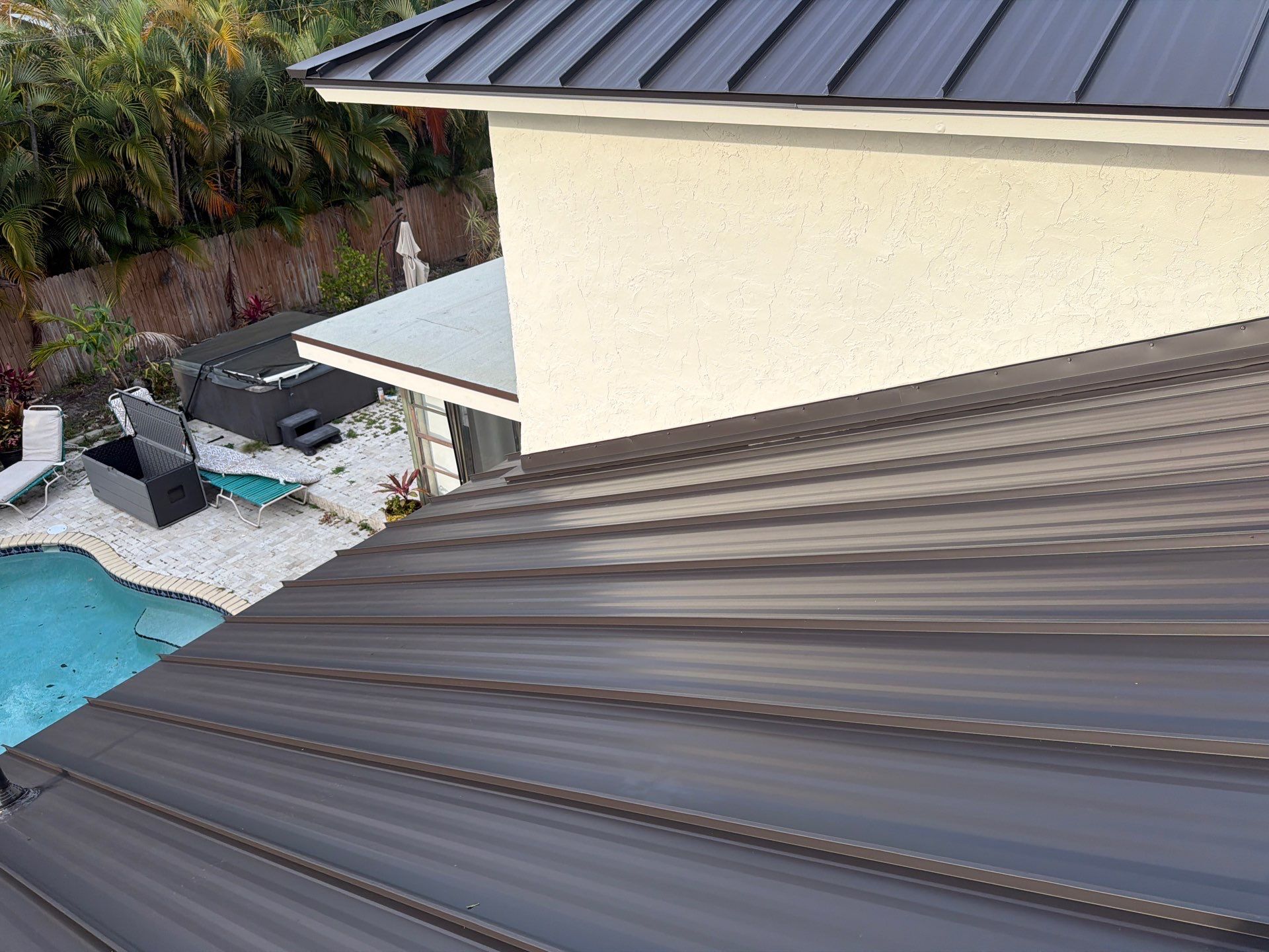 Residential Roofing Installation using 1.5'' Mechanical Seam by BLUES BROTHERS ROOFING